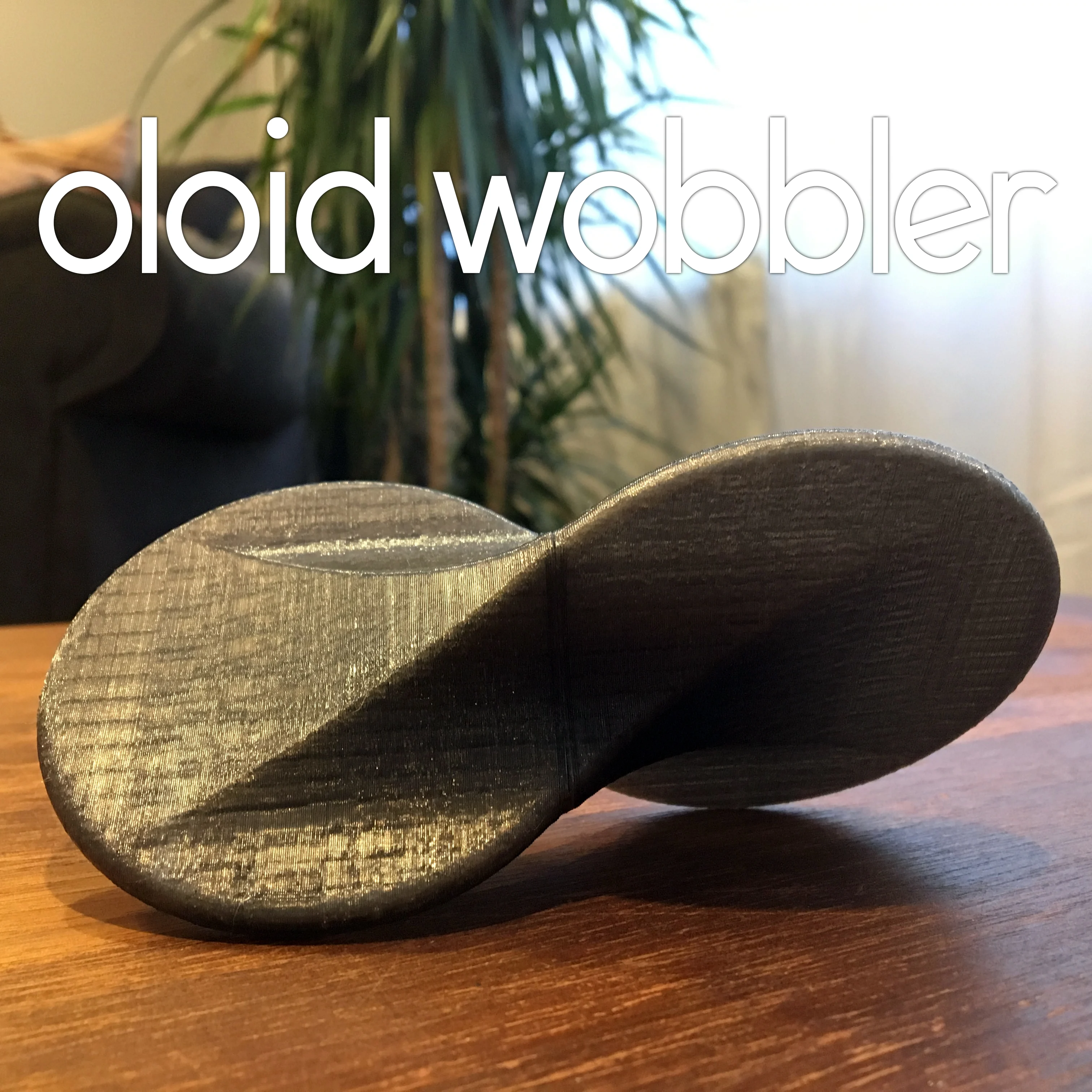 Oloid Wobbler (rolling fidget desk toy)