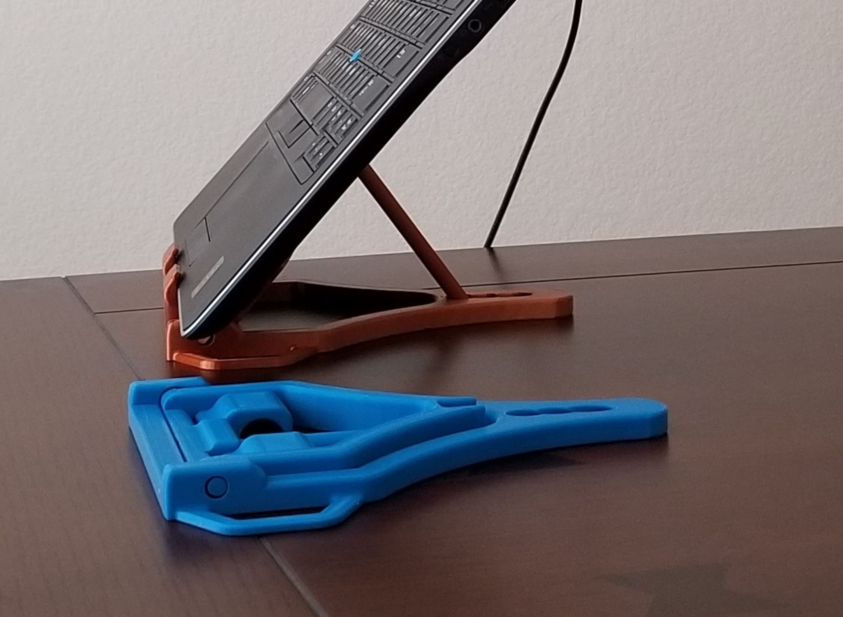 Foldable Laptop, Switch, Tablet, and Mobile phone stand.  Prints fully assembled.