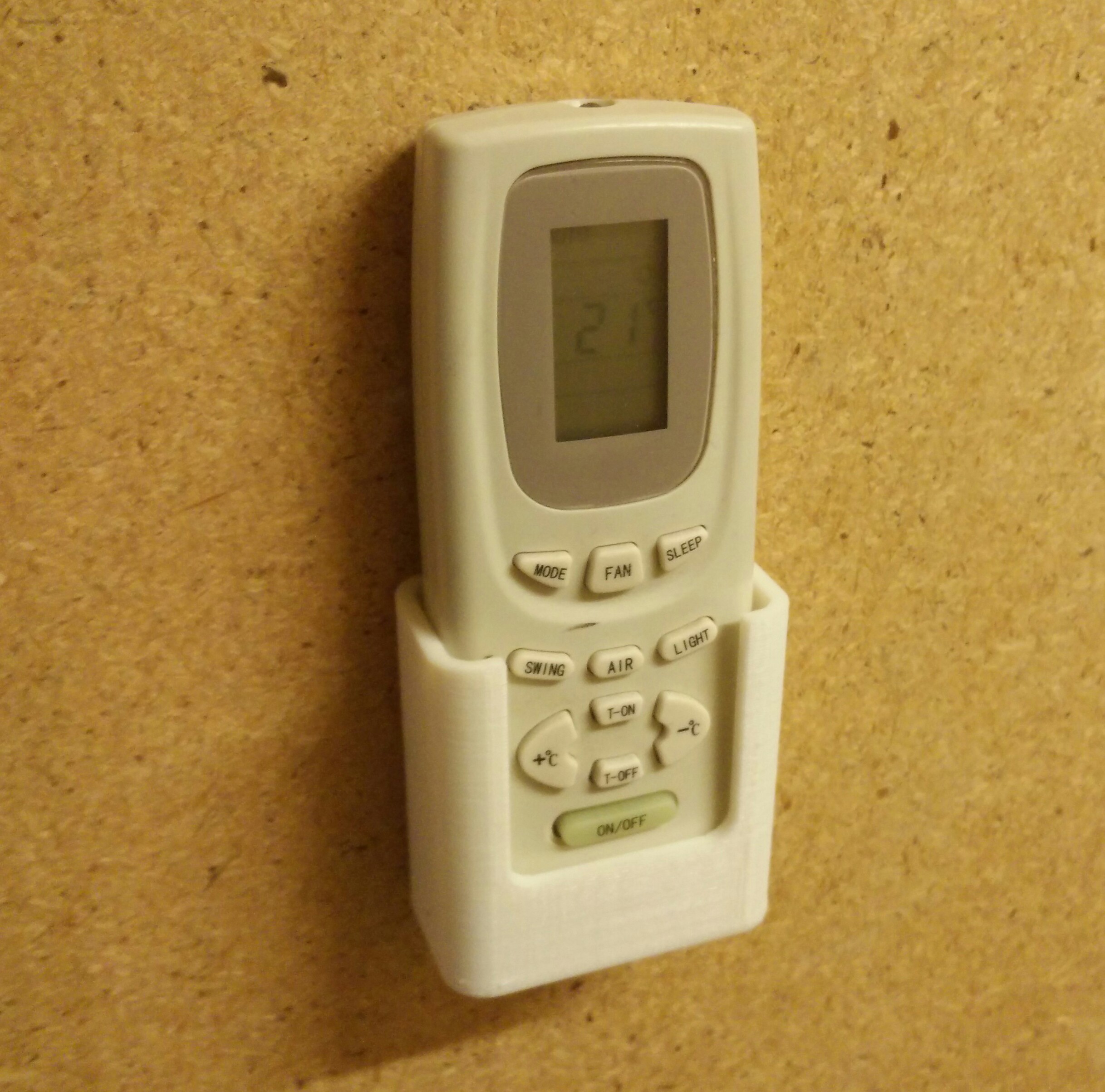 Parametric wall holder for remote control