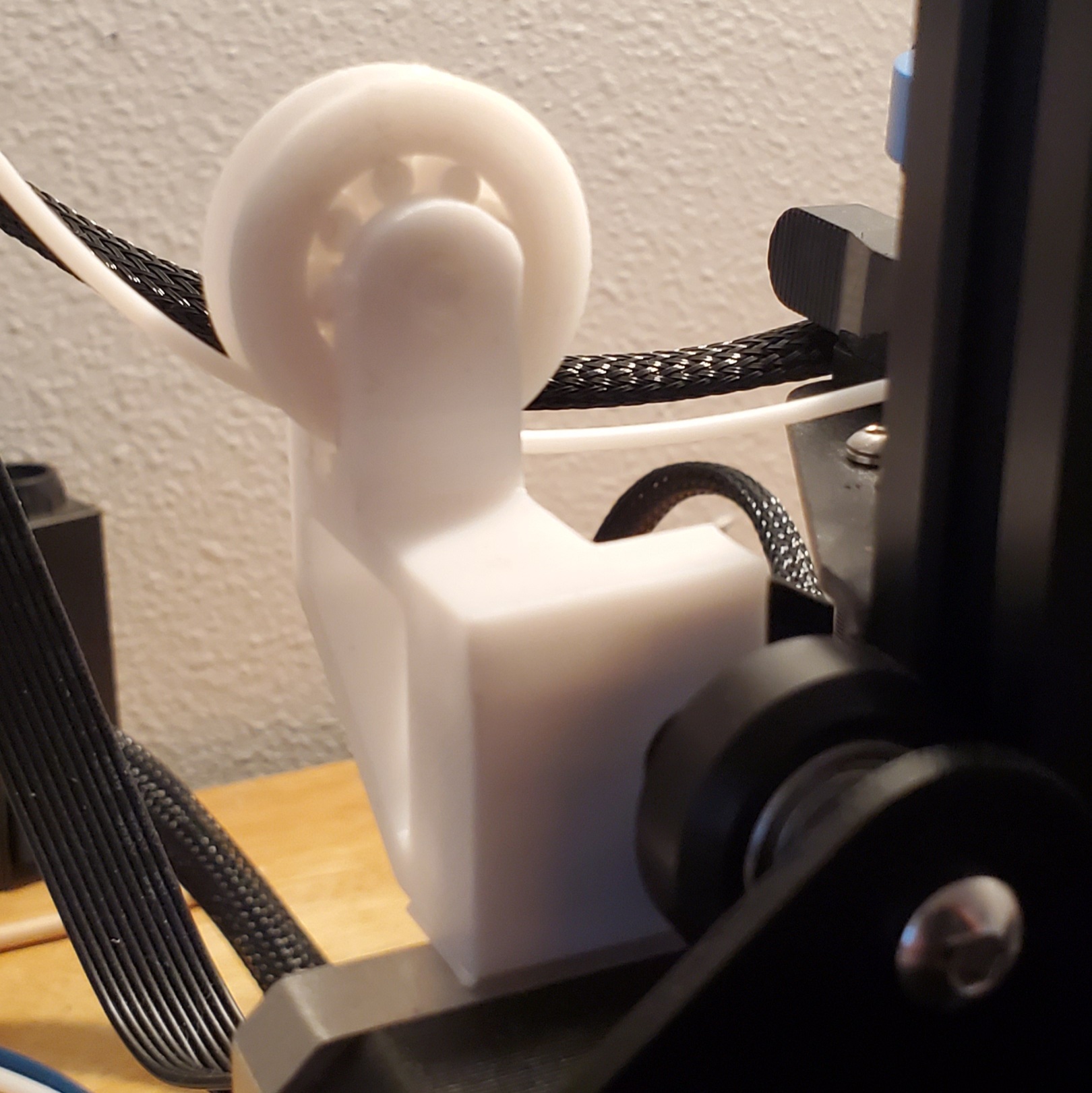 Ender 3 V2 Filament Guide with wheel and print in place bearing