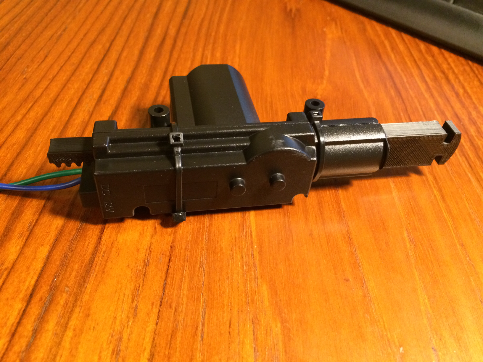 Gear Block to Extend Throw on Universal Power Door Lock Actuator