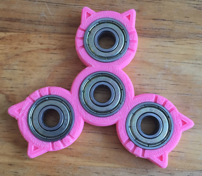 Triple cat spinner
