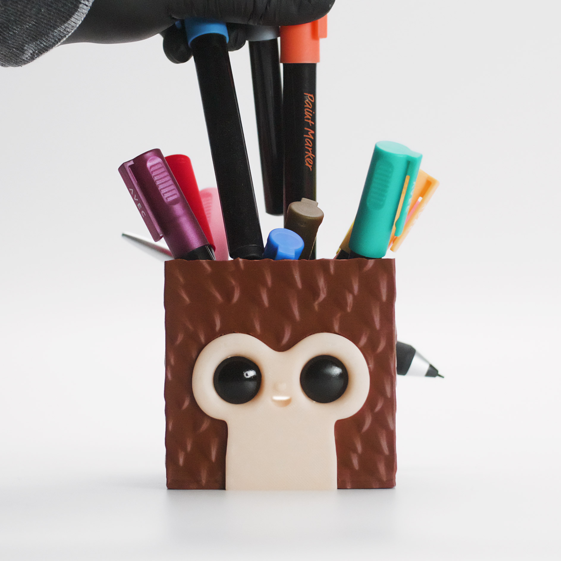 Default Cube meets Suzanne, a Pixel Monkey Storage Box with Pen Tail
