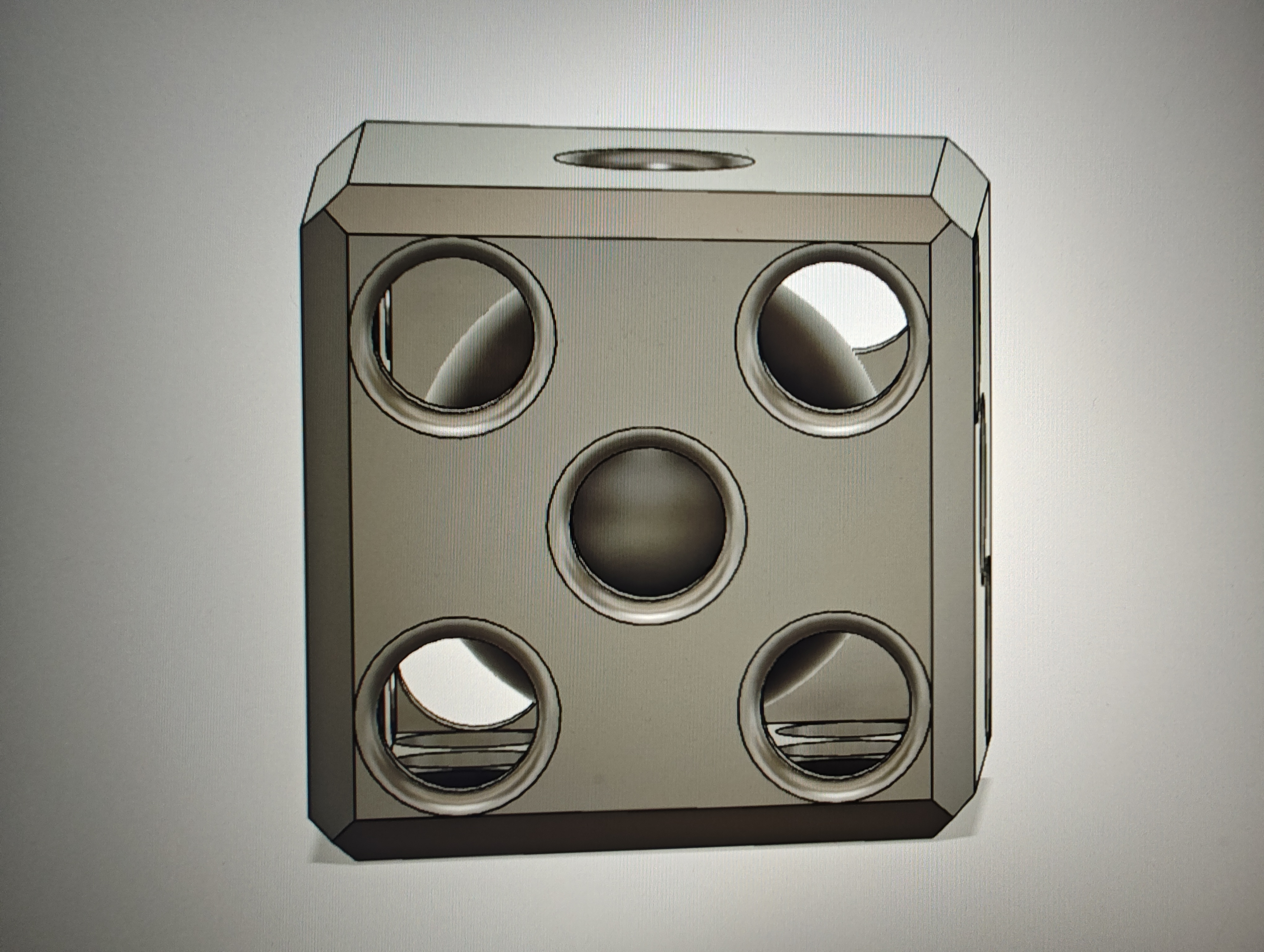 hollow dice with moving sphere inside