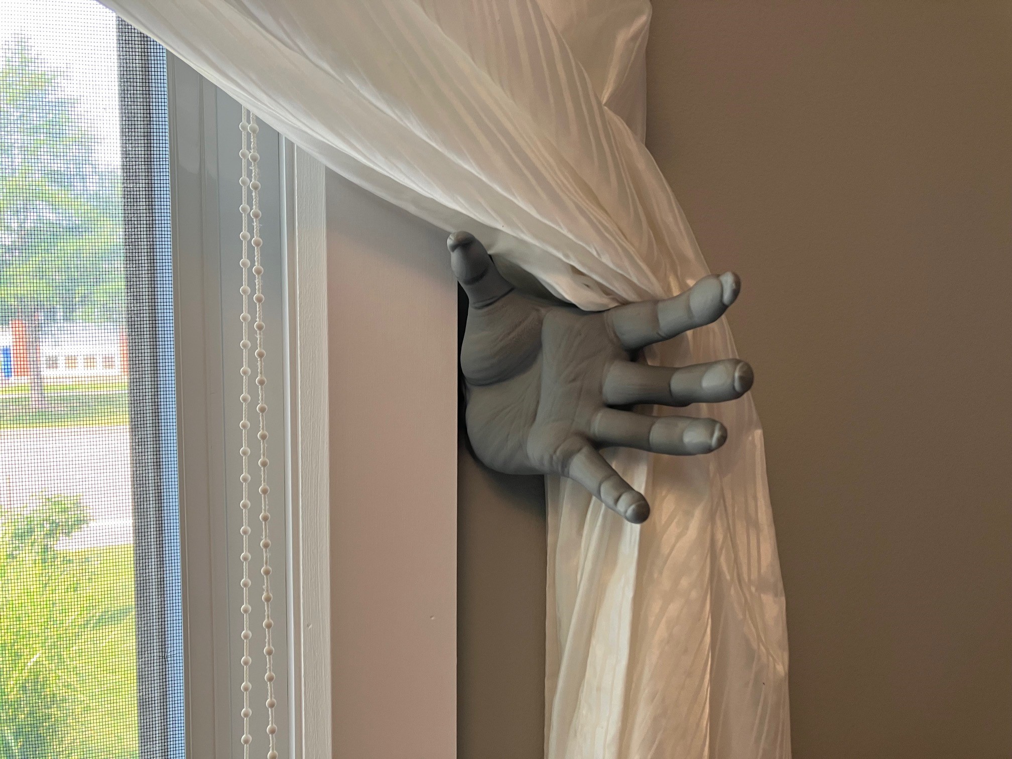 Demon hand curtain hooks