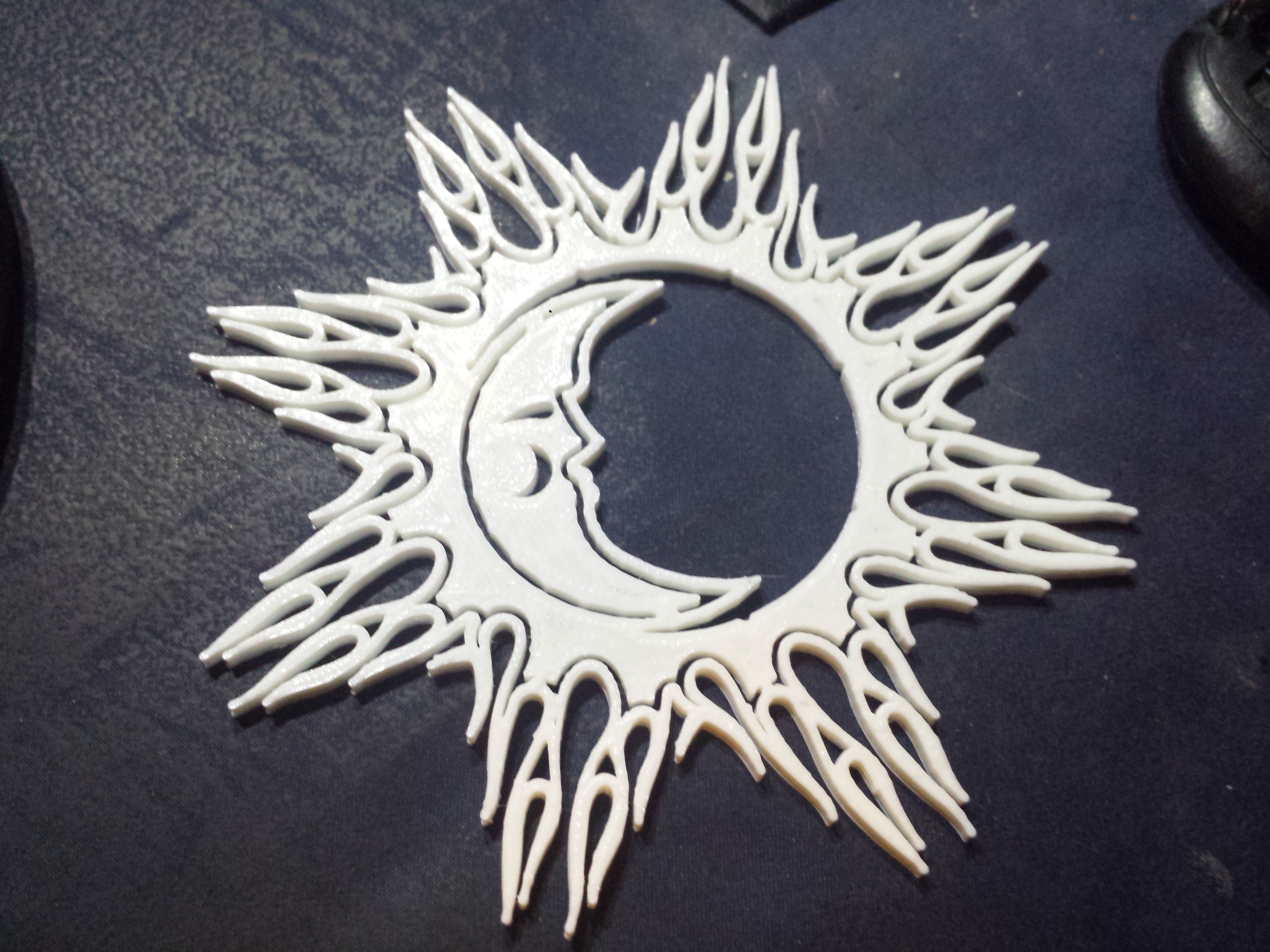 Sun and Moon plaque
