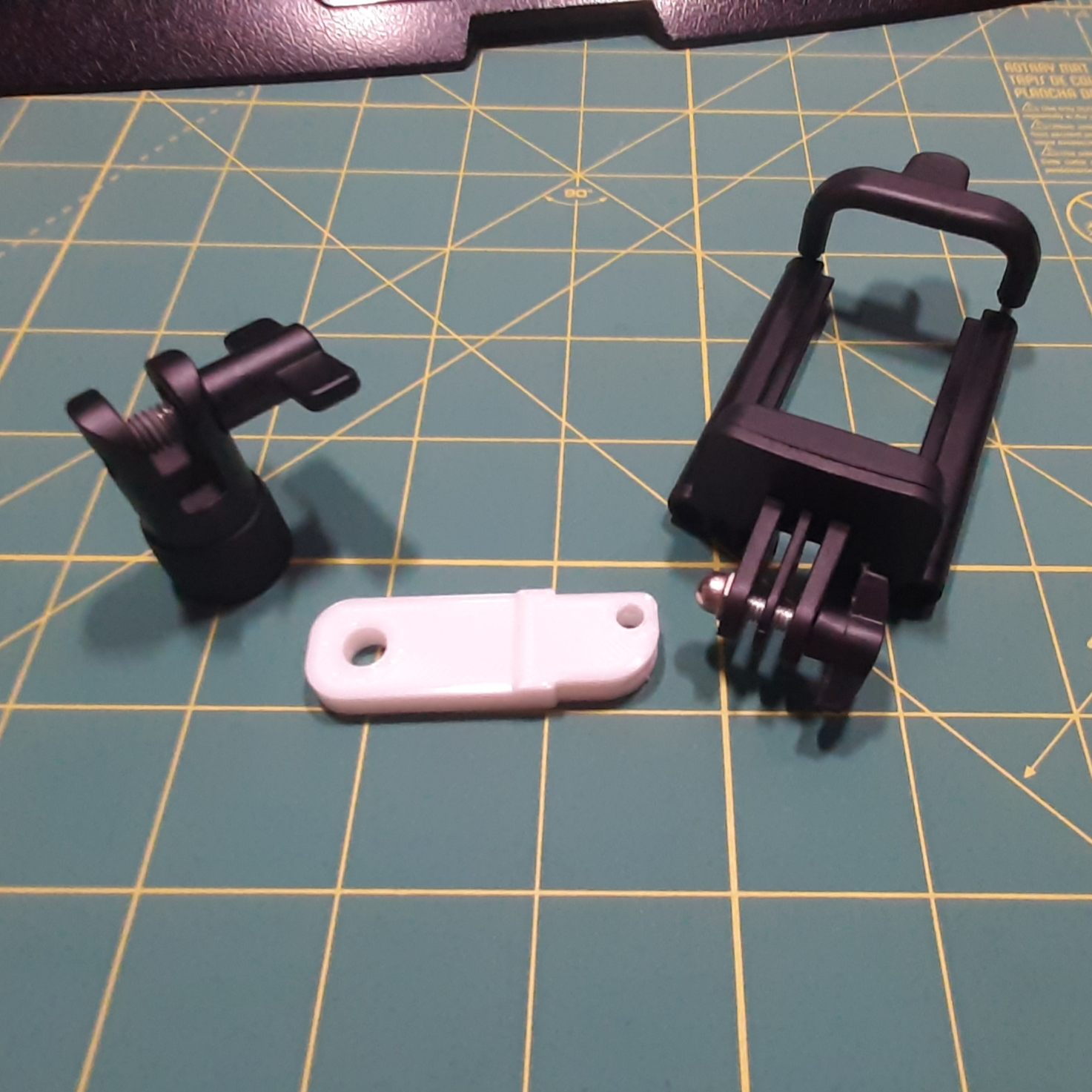 Phone holder to microphone boom