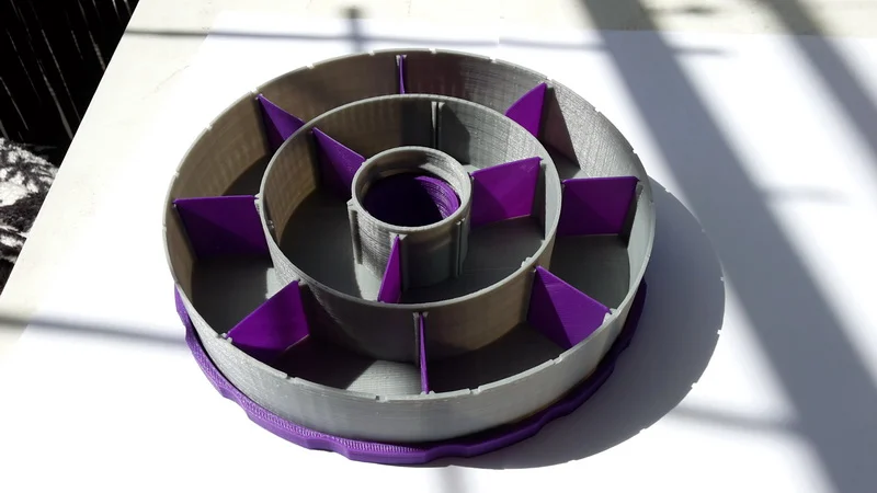 Round donut organizer for small parts, resizable sections.
