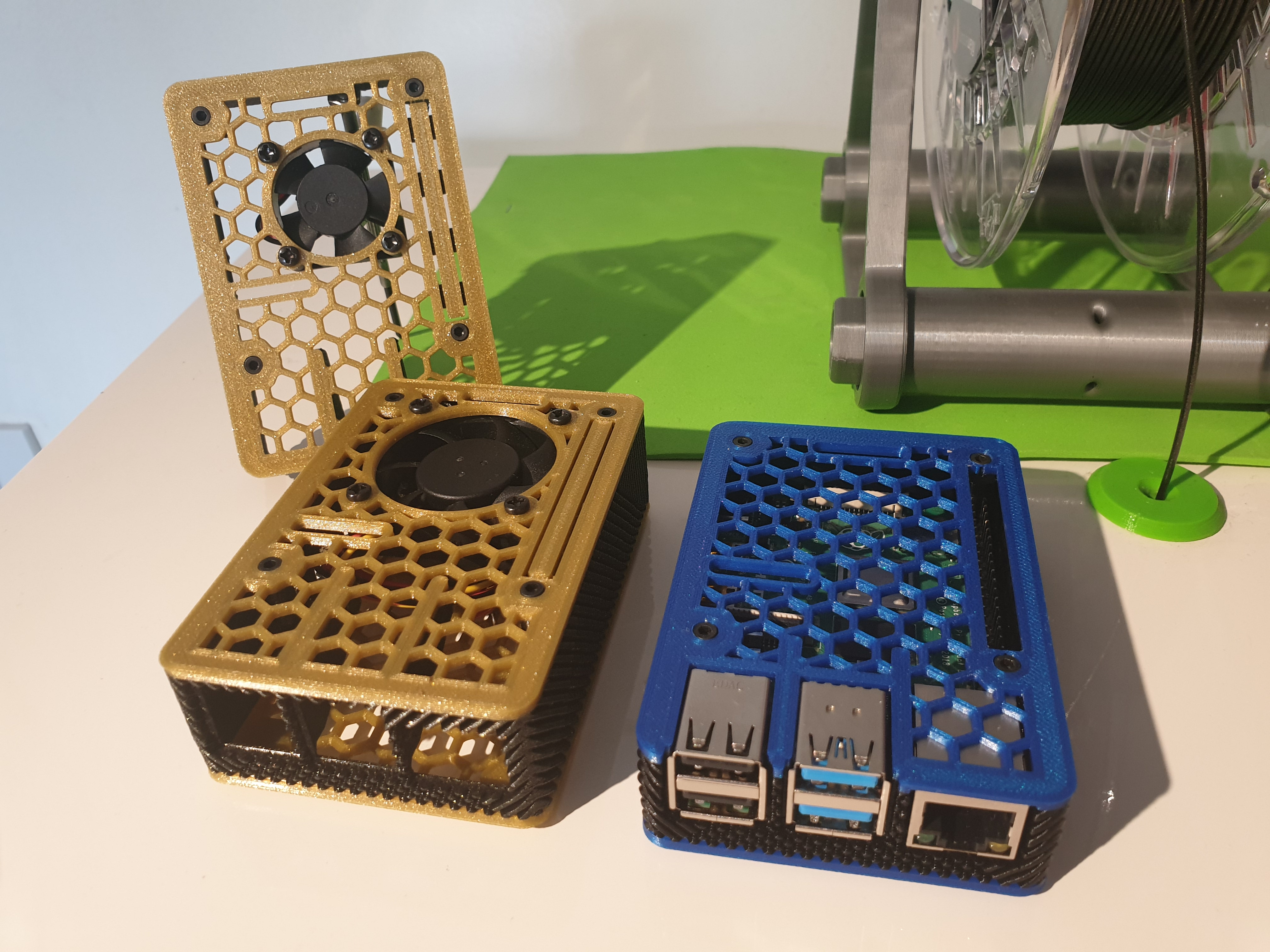 Raspberry Pi 4 case with break-out GPIO tab + fan versions