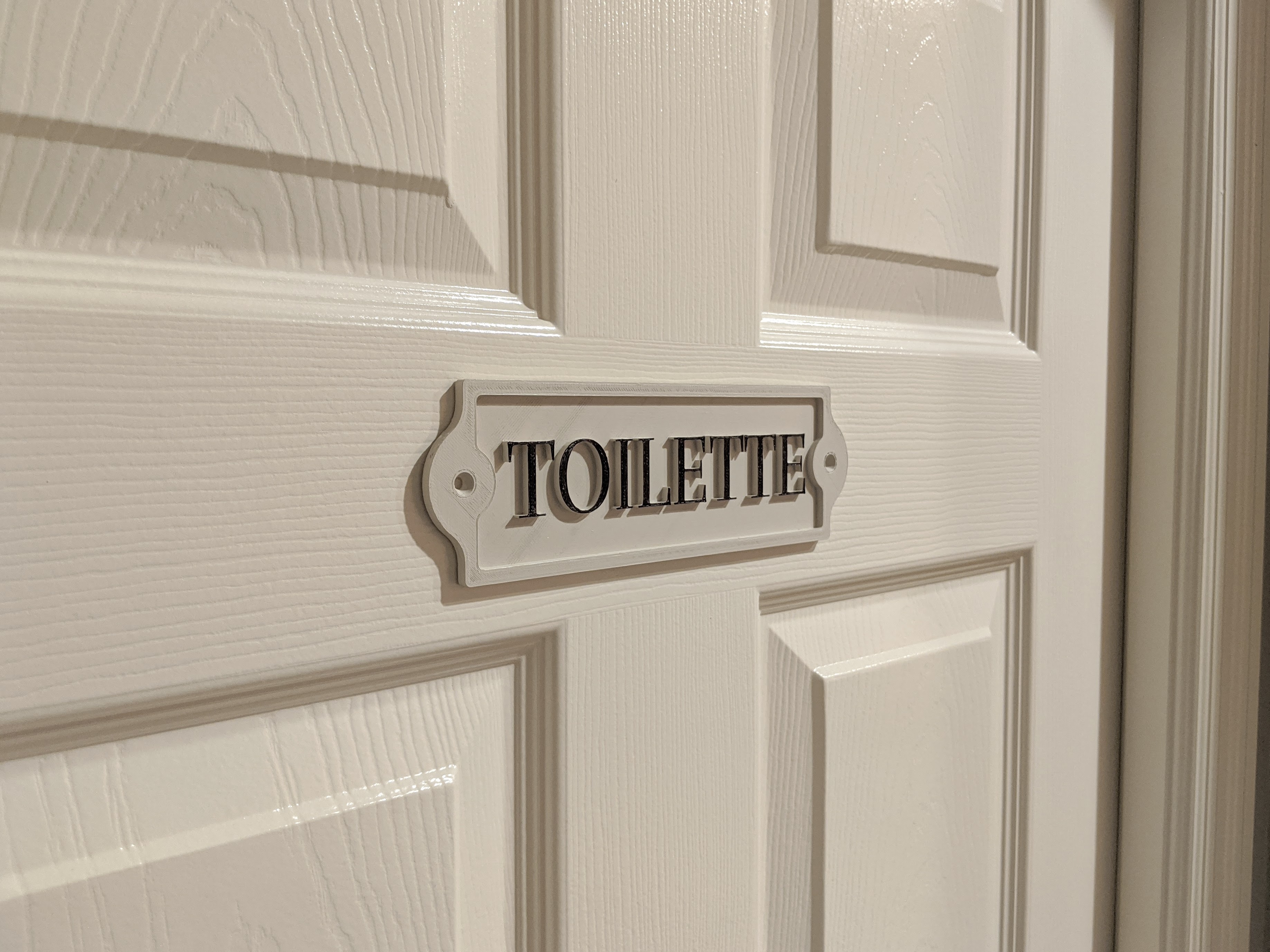 Toilette Door Sign