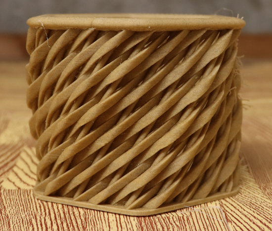 Hex shaped woven basket with a twist