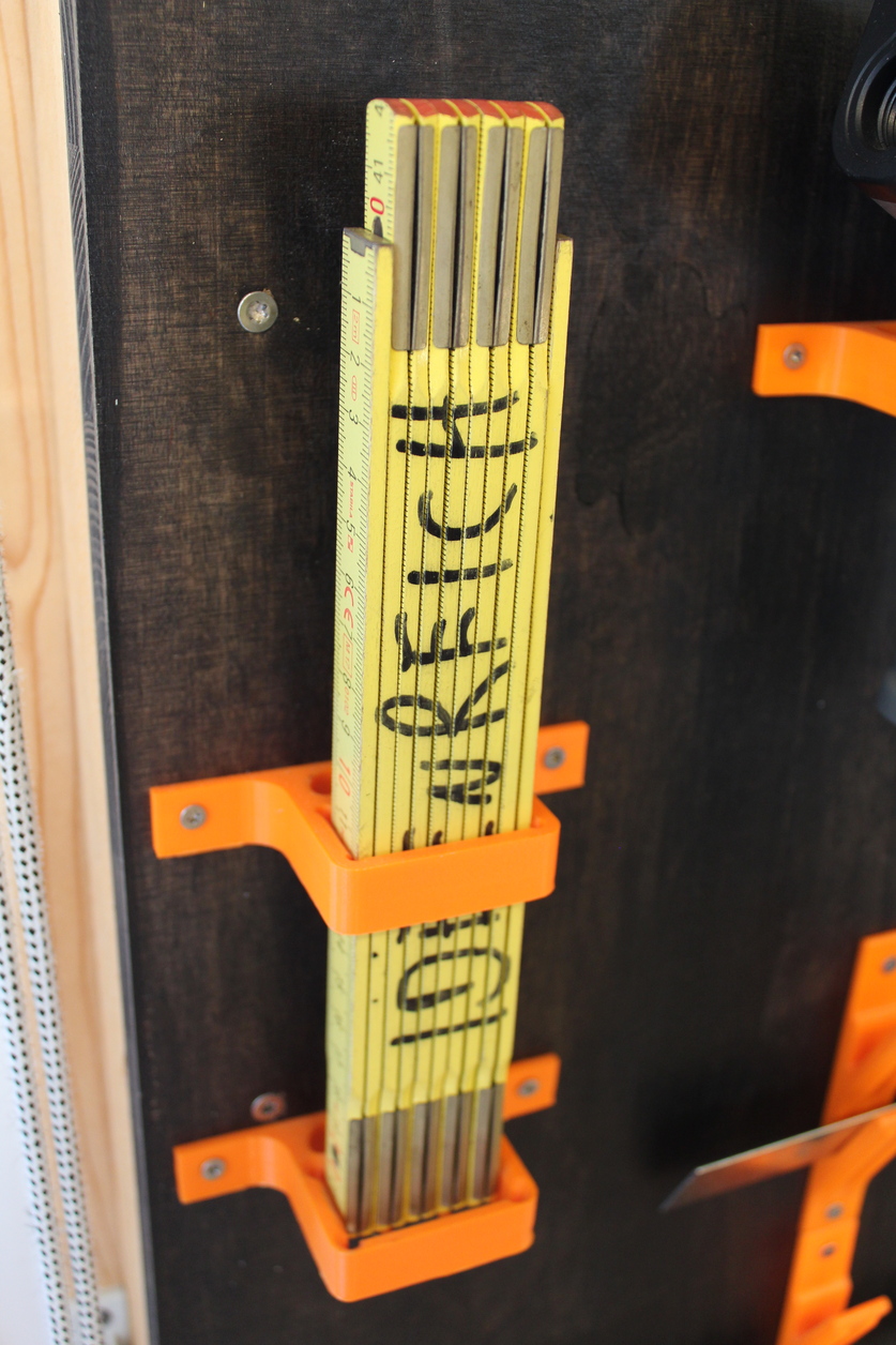 folding rule wall mount