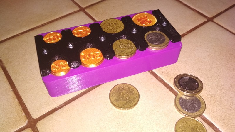 Distributeur de monnaies automatique