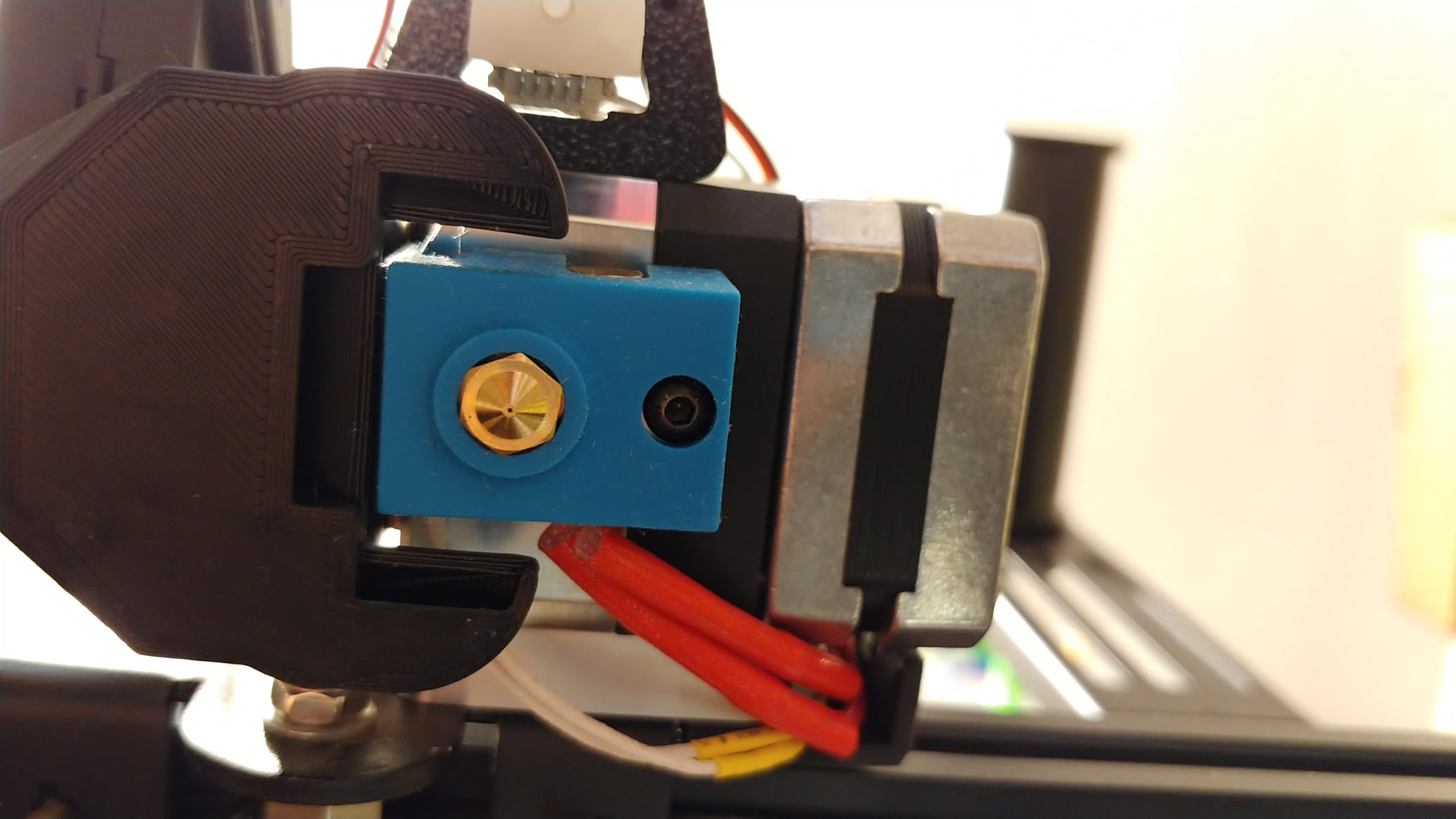 Larger fan shroud for AL-BMG extruder from trianglelabs
