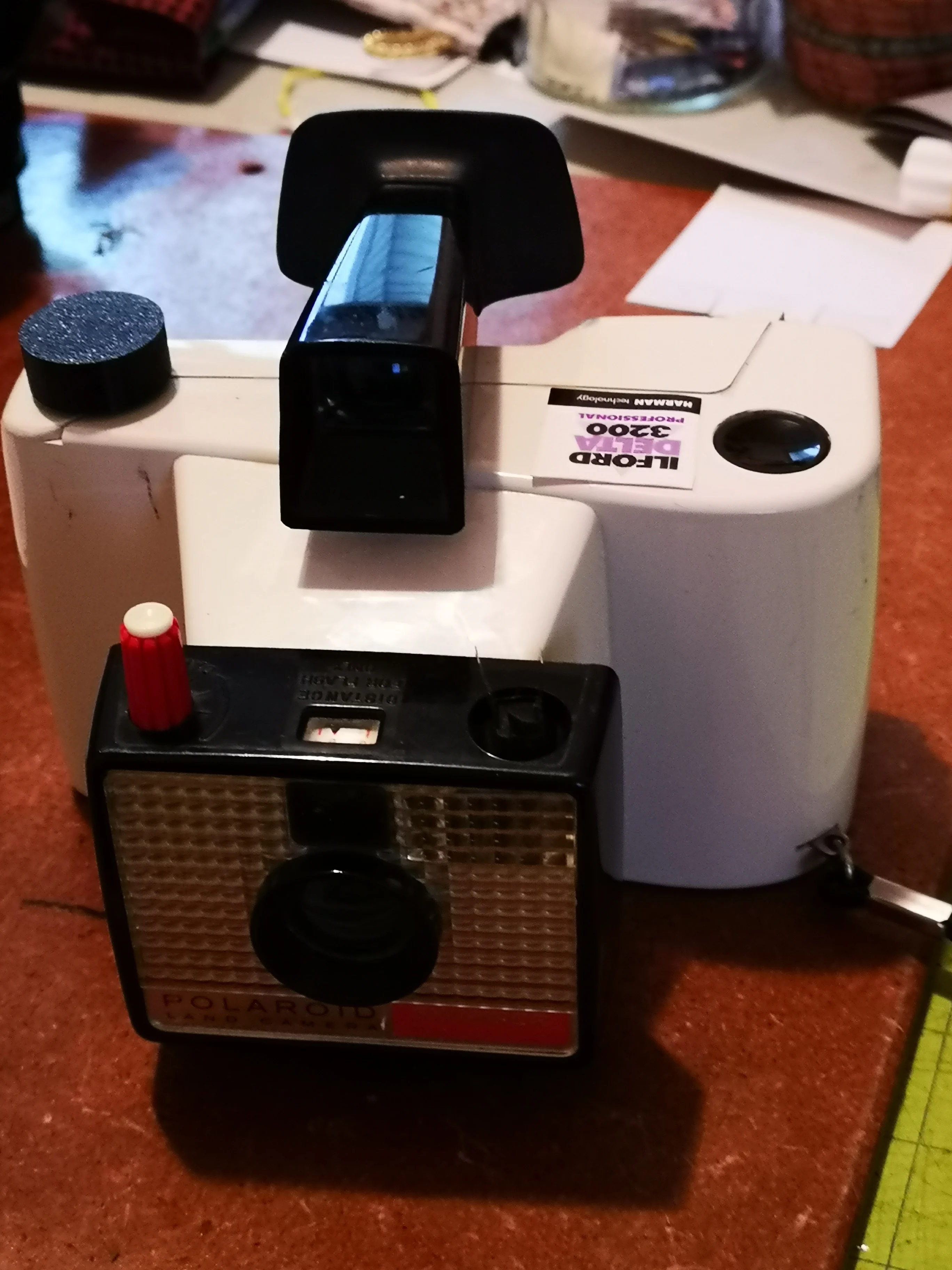 120 film modification for Polaroid Swinger
