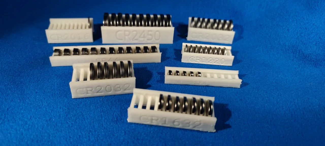Abundant collection of coin cell holders