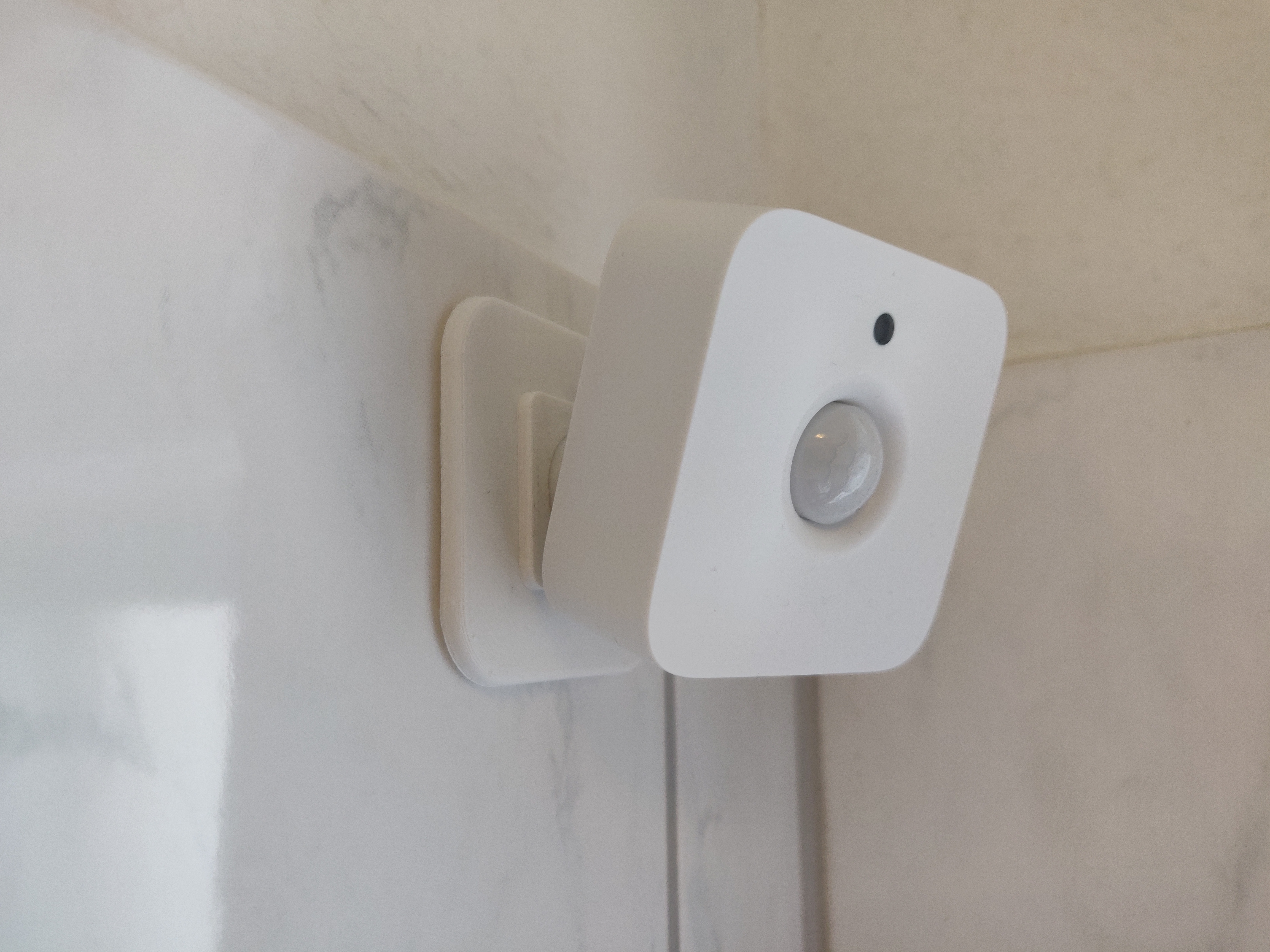 Holder for Philips Hue Motion Sensor, adhesive attachment