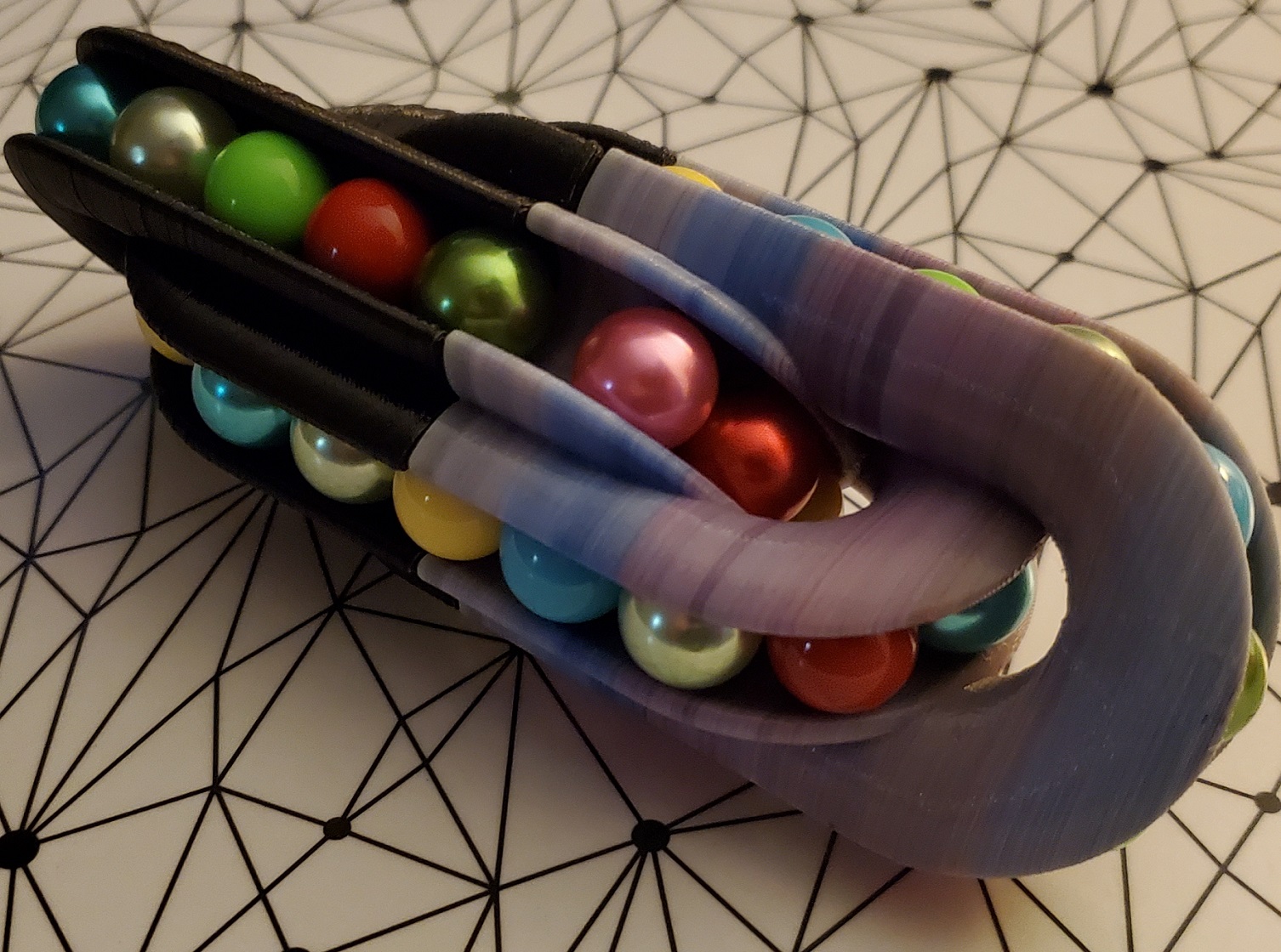 The Triple Chain (Twisty sliding marble puzzle)