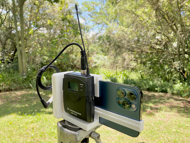 Videographer iPhone 12 Pro Max tripod or hand holder for field production / video
