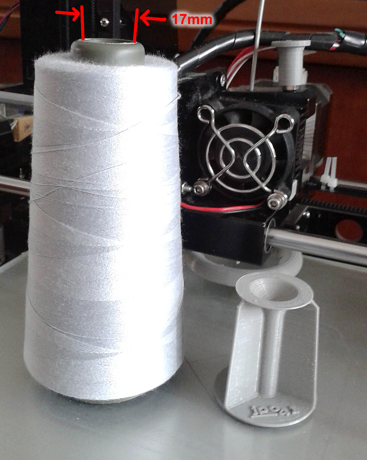 Porta carrete de hilo de coser