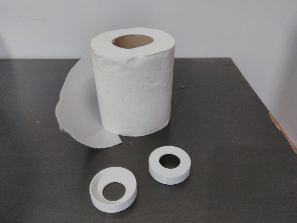 Tapa papel higiénico