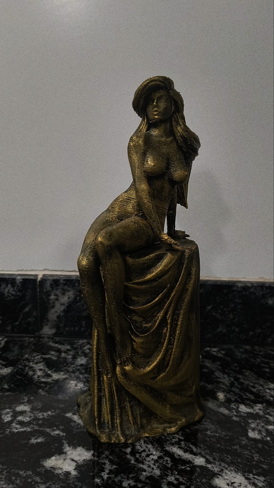 Sitting woman sculpture