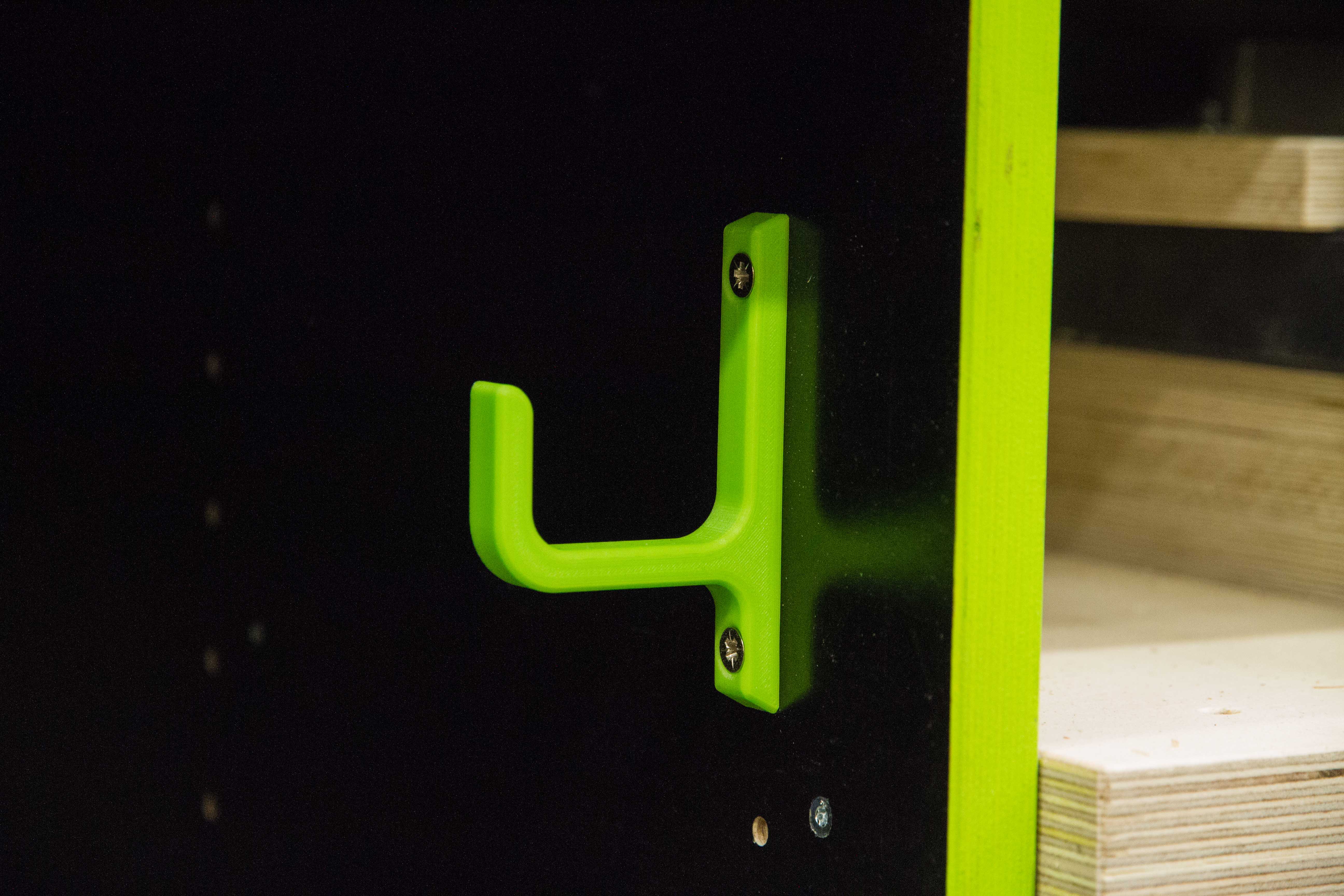 Cable and vacuumhose holder