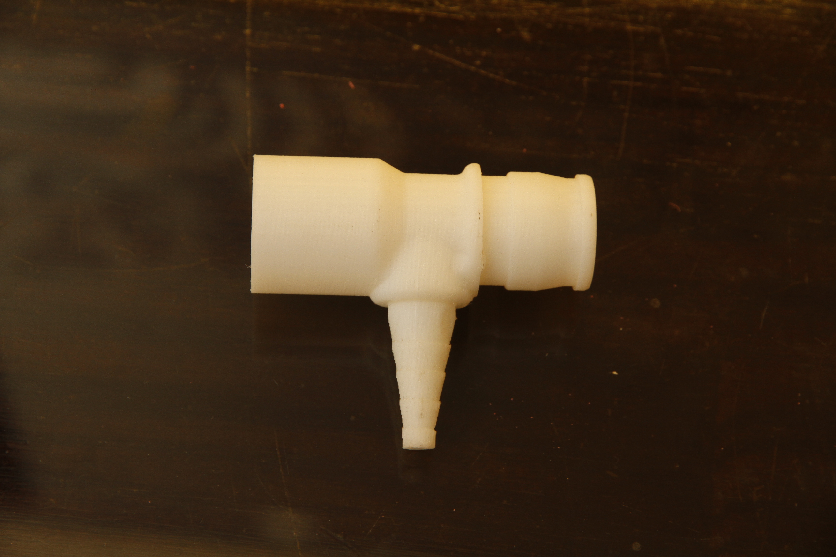 Nebuliser fitting with 'Christmas tree' side fitting