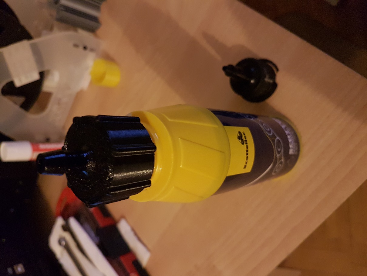 Scottoiler bottle cap with nozzle