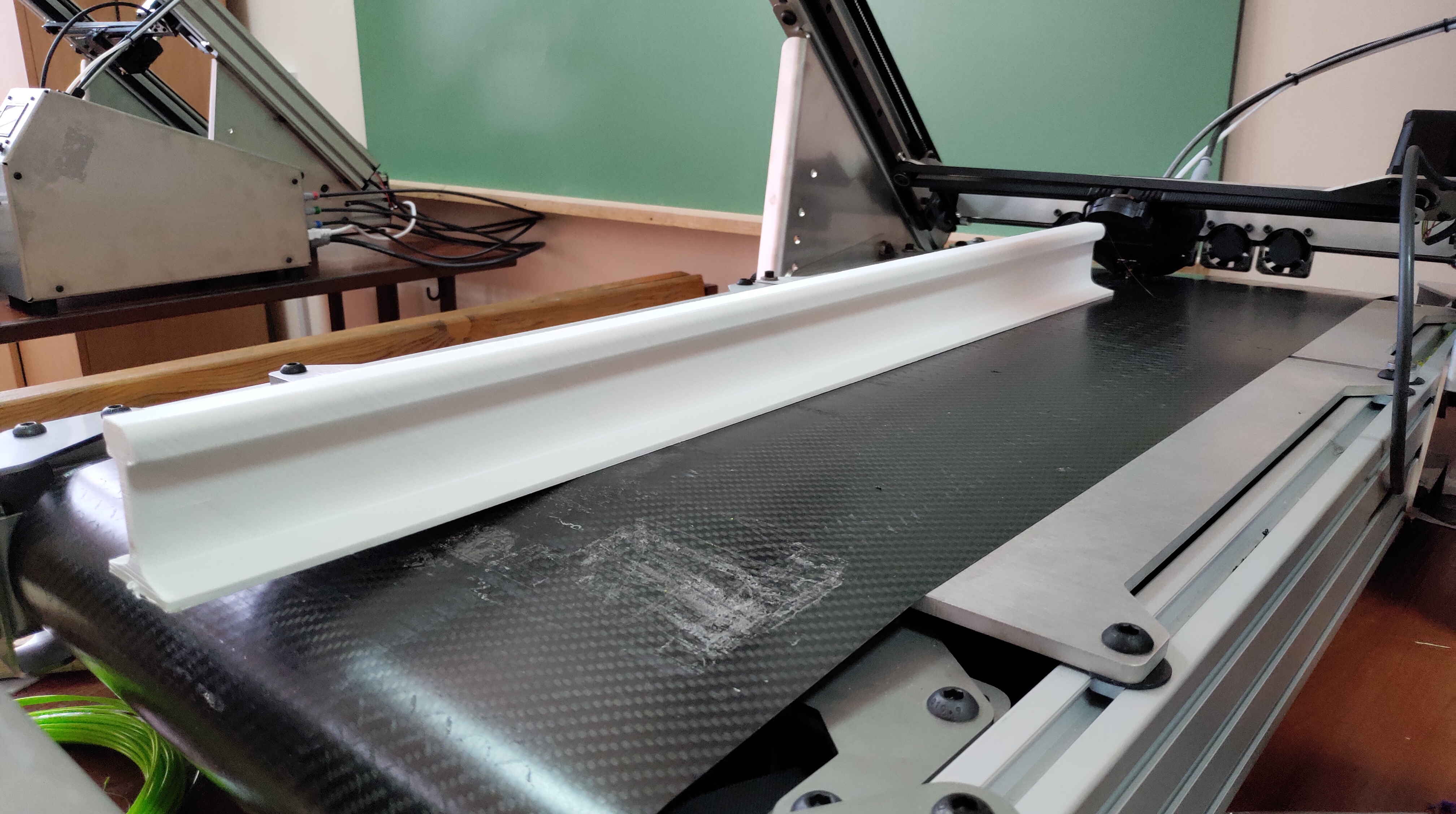 Rail for print belt printer