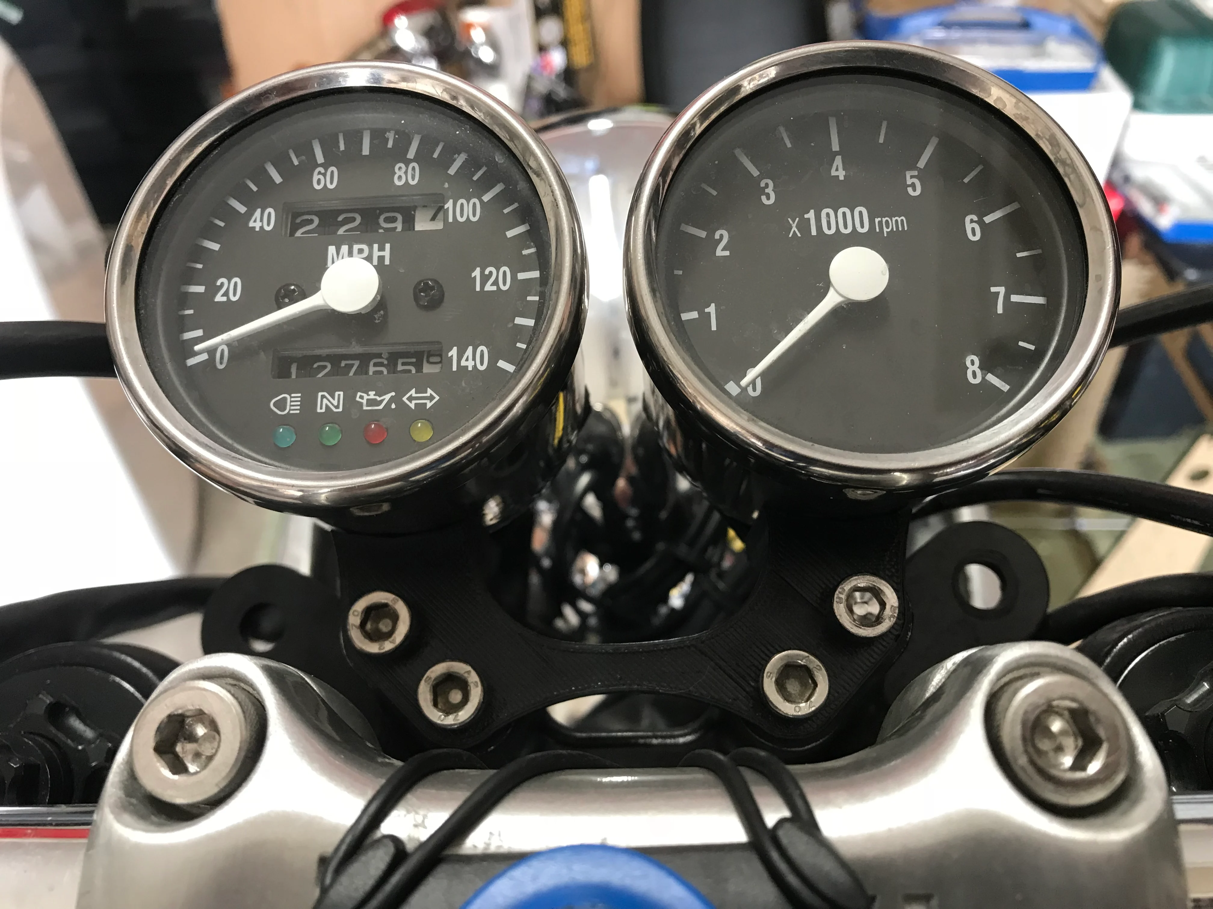 Triumph double gauge bracket