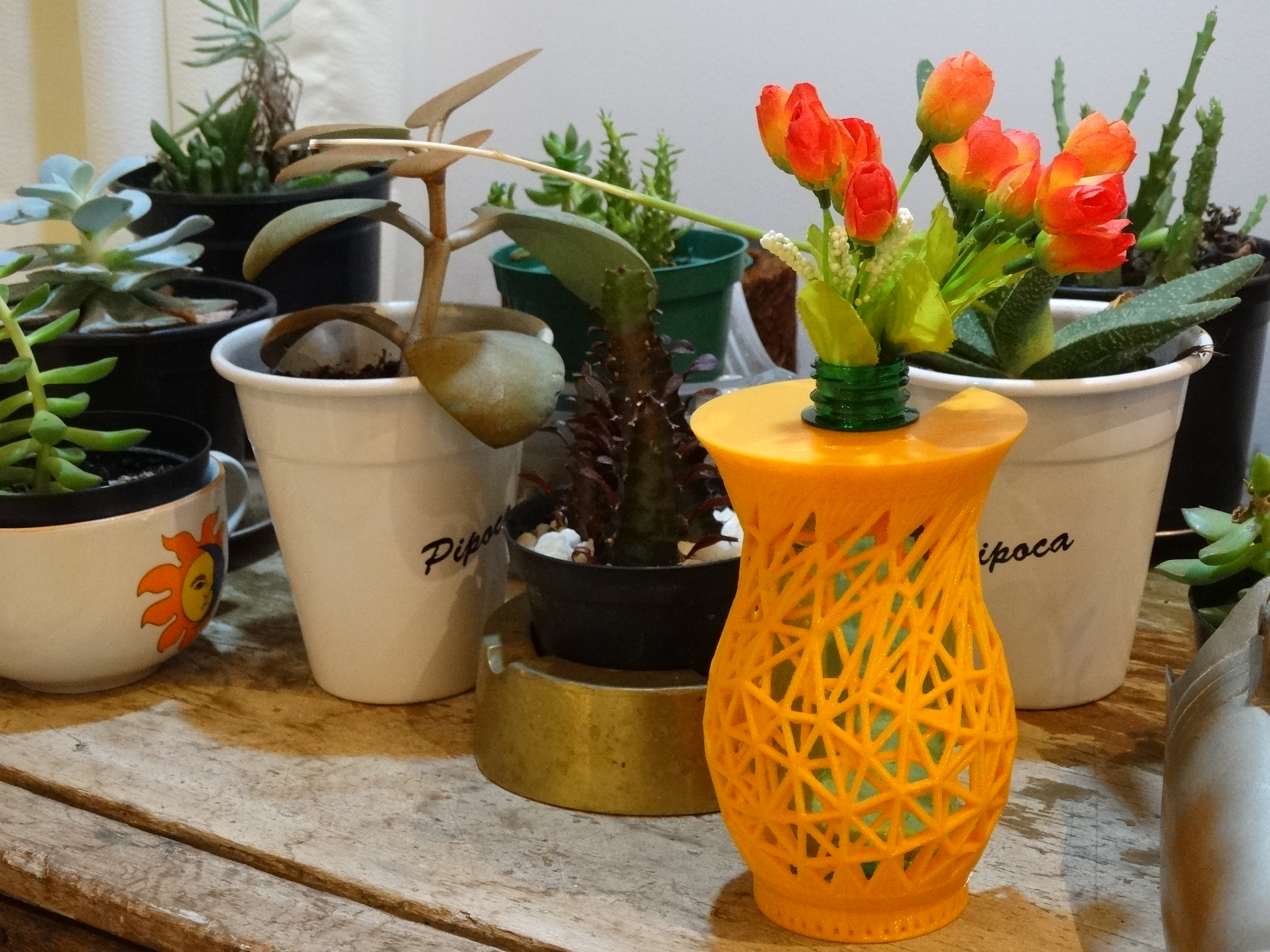 Think outside the mini bottle vases