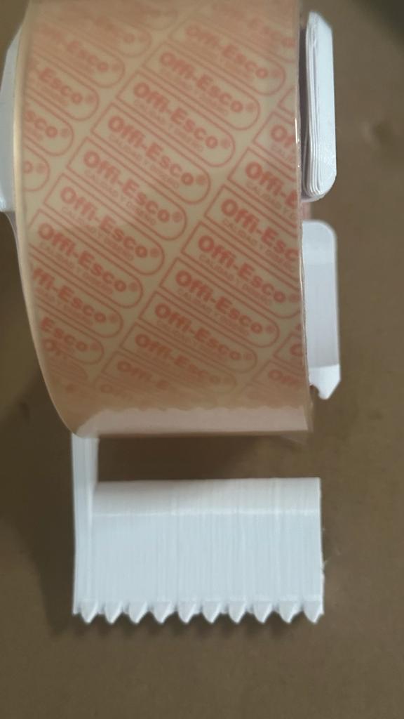 Packing tape dispensor