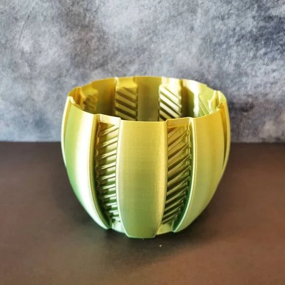 Orange planter with spiral stripes (vasemode)