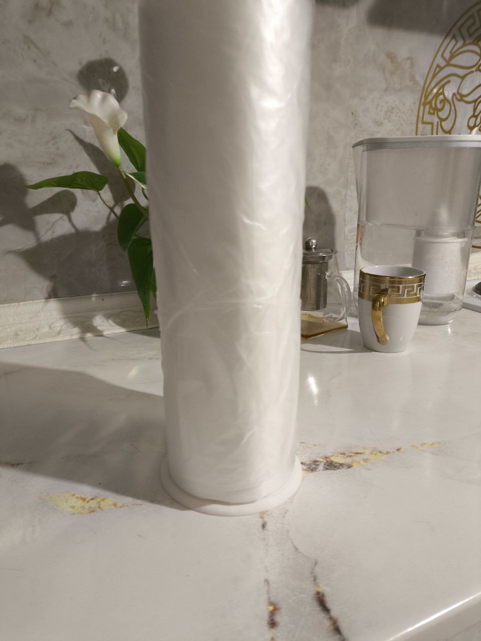 Paper towel/cellophane bags holder
