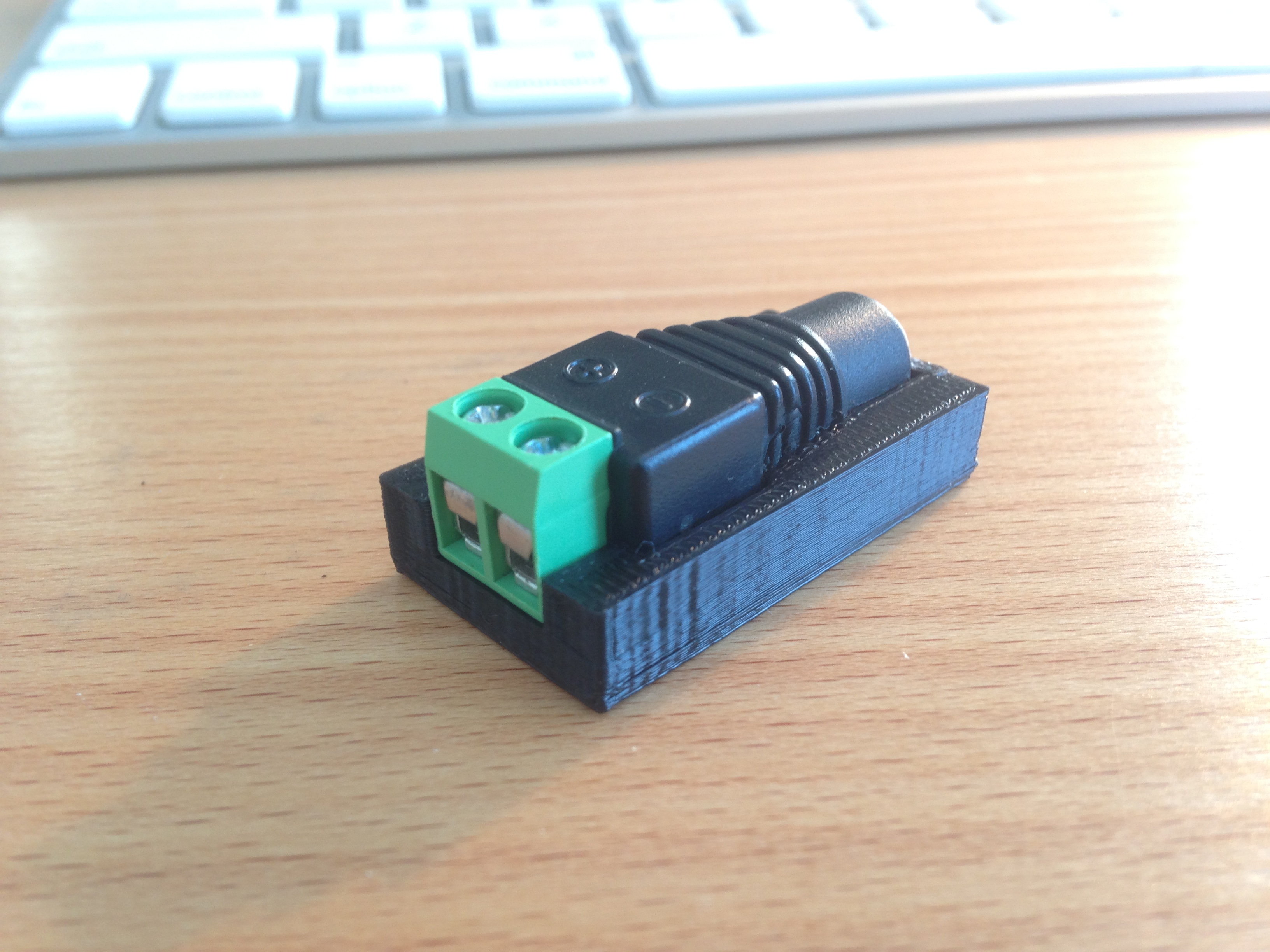 DC Power adapter press-fit mount