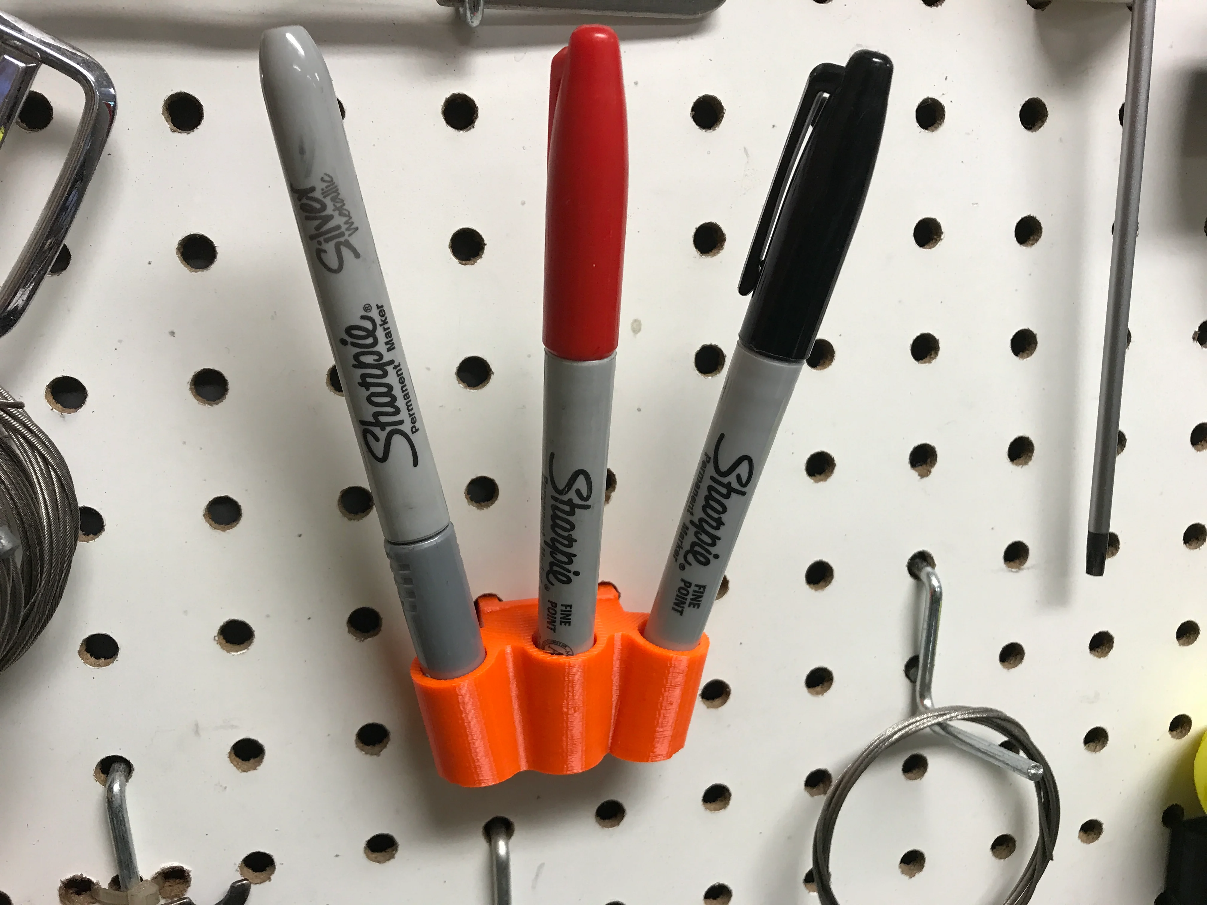 Sharpie holder for pegboard