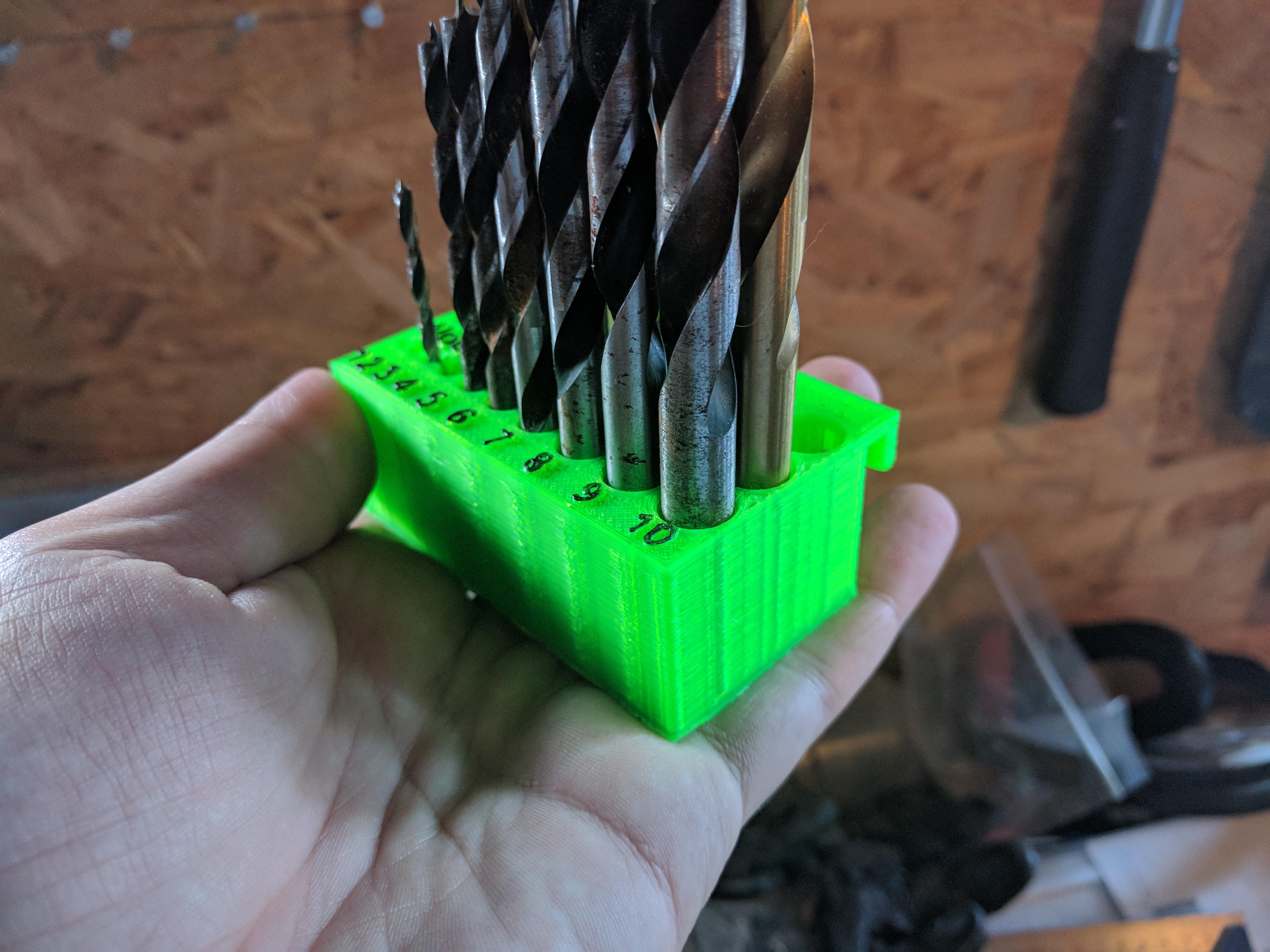 Detachable drillbit holder for tool wall