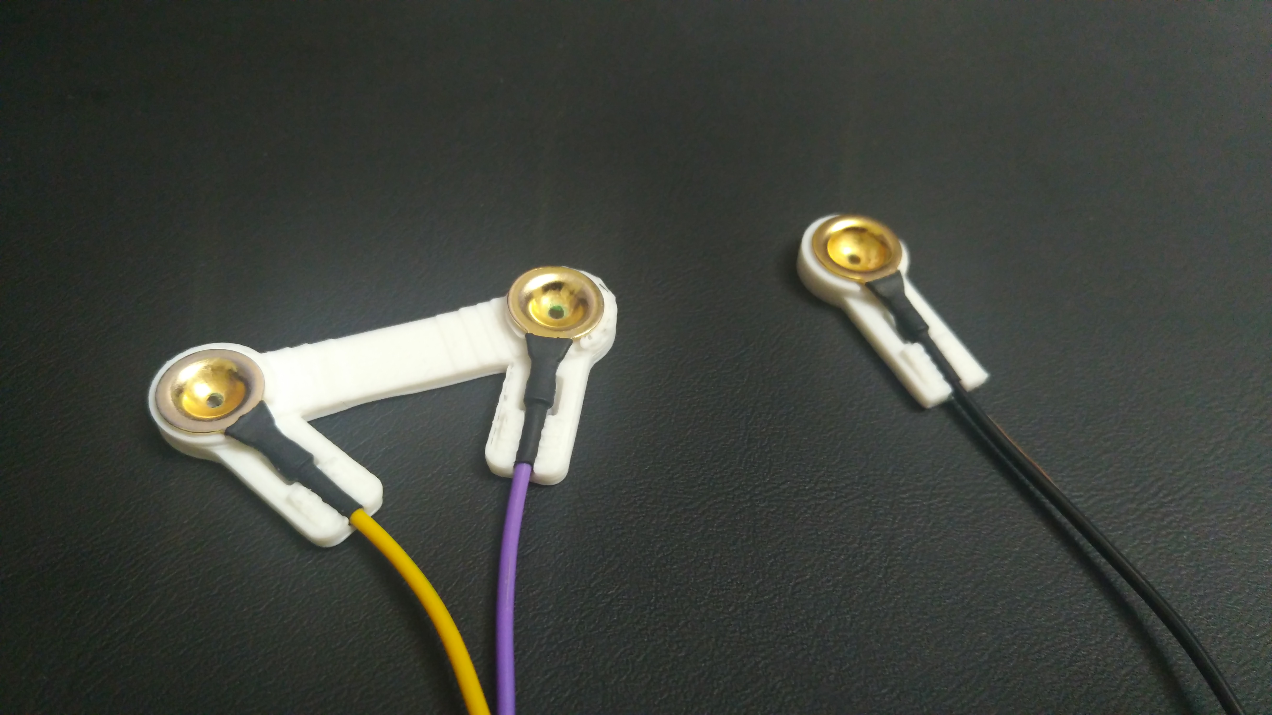 Gold cup EEG electrode holders