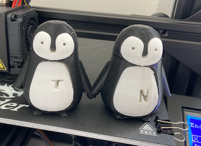 Penguin couple with drawer belly as secret hidden compartment cute penguins