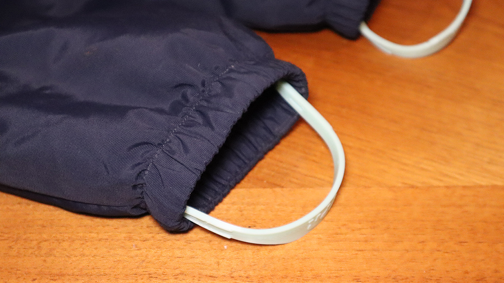 Kid's coveralls foot strap