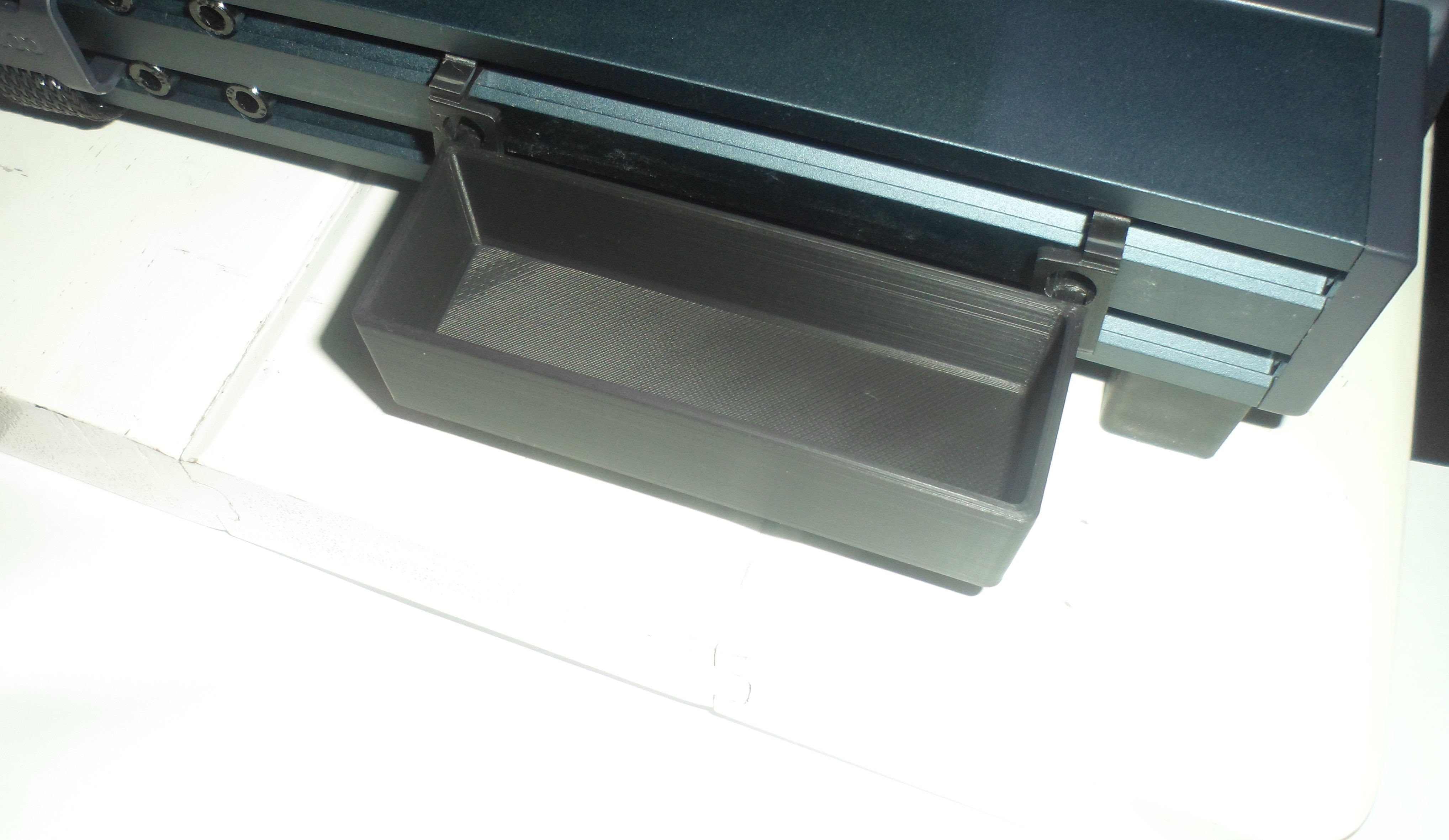 Click in place waste holder.