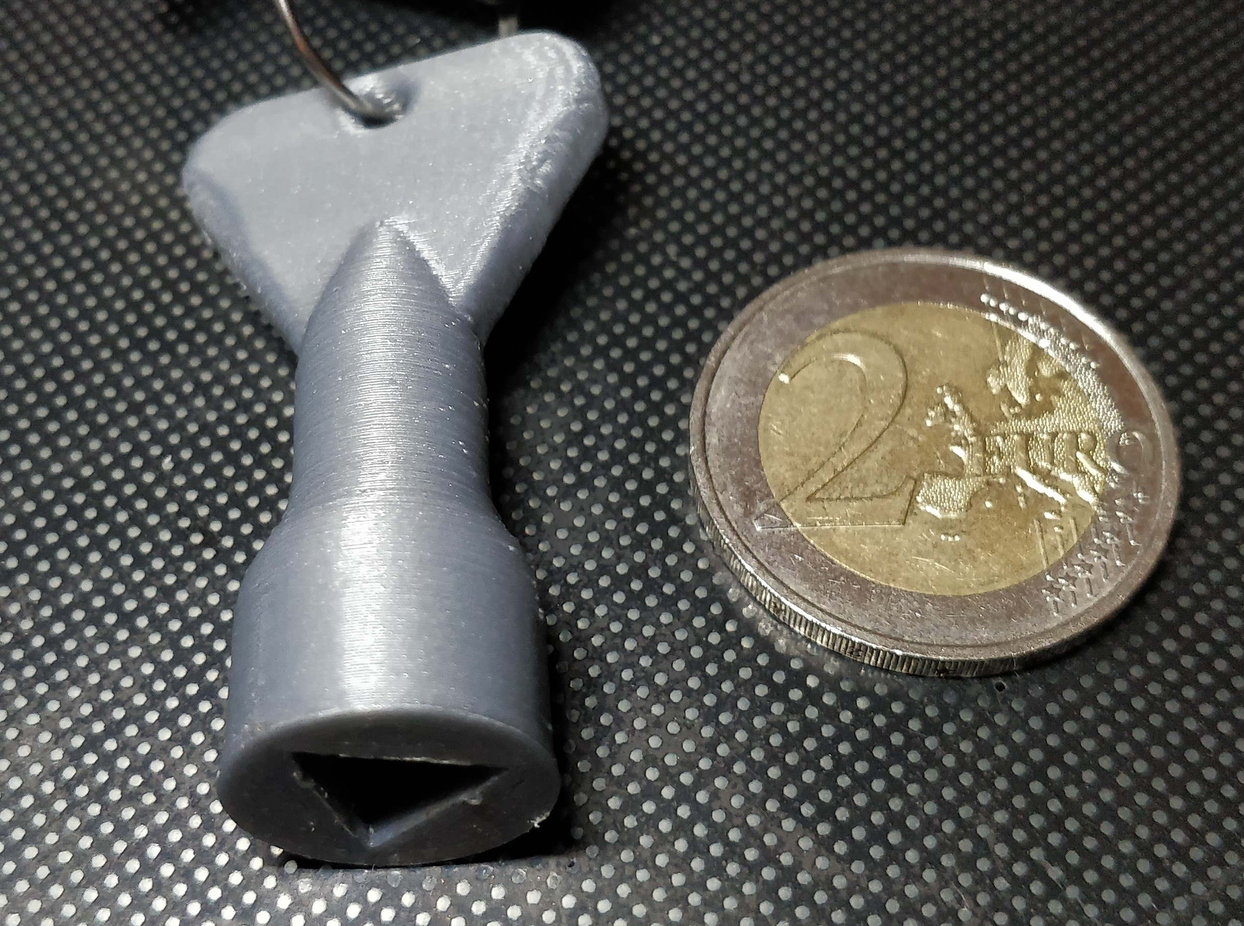 Recycling bin triangle key opener