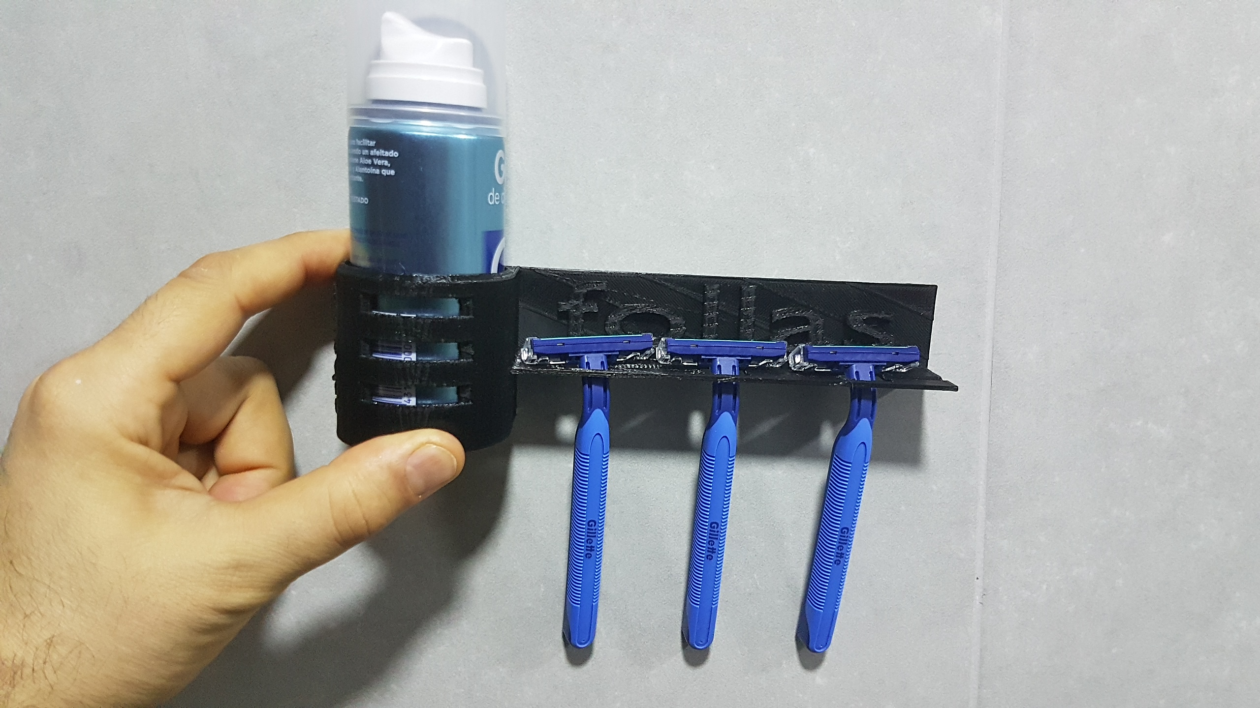 Razors holder with shaving cream.
