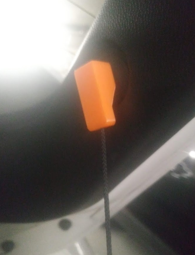 Mazda 3 trunk shade catch