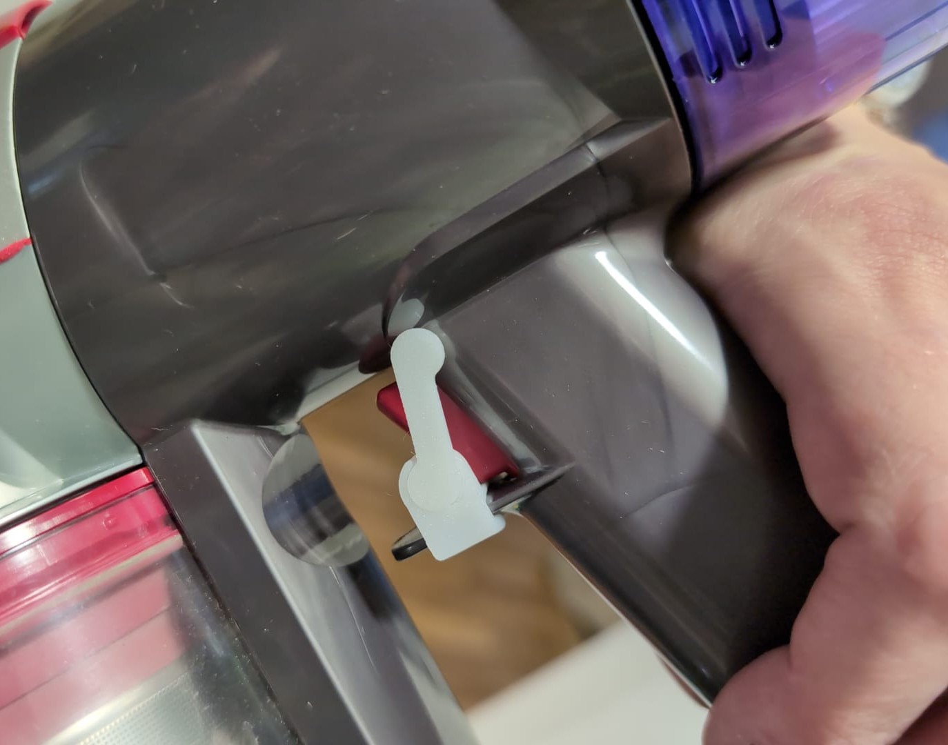 Dyson trigger lock