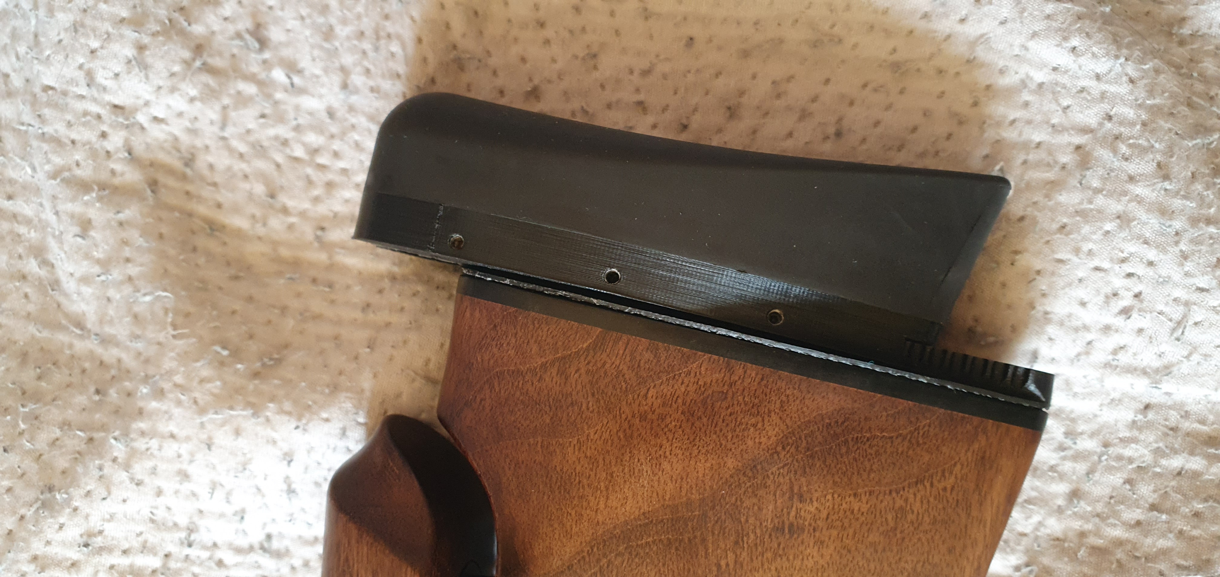Tikka T3x vertical adjustment buttpad