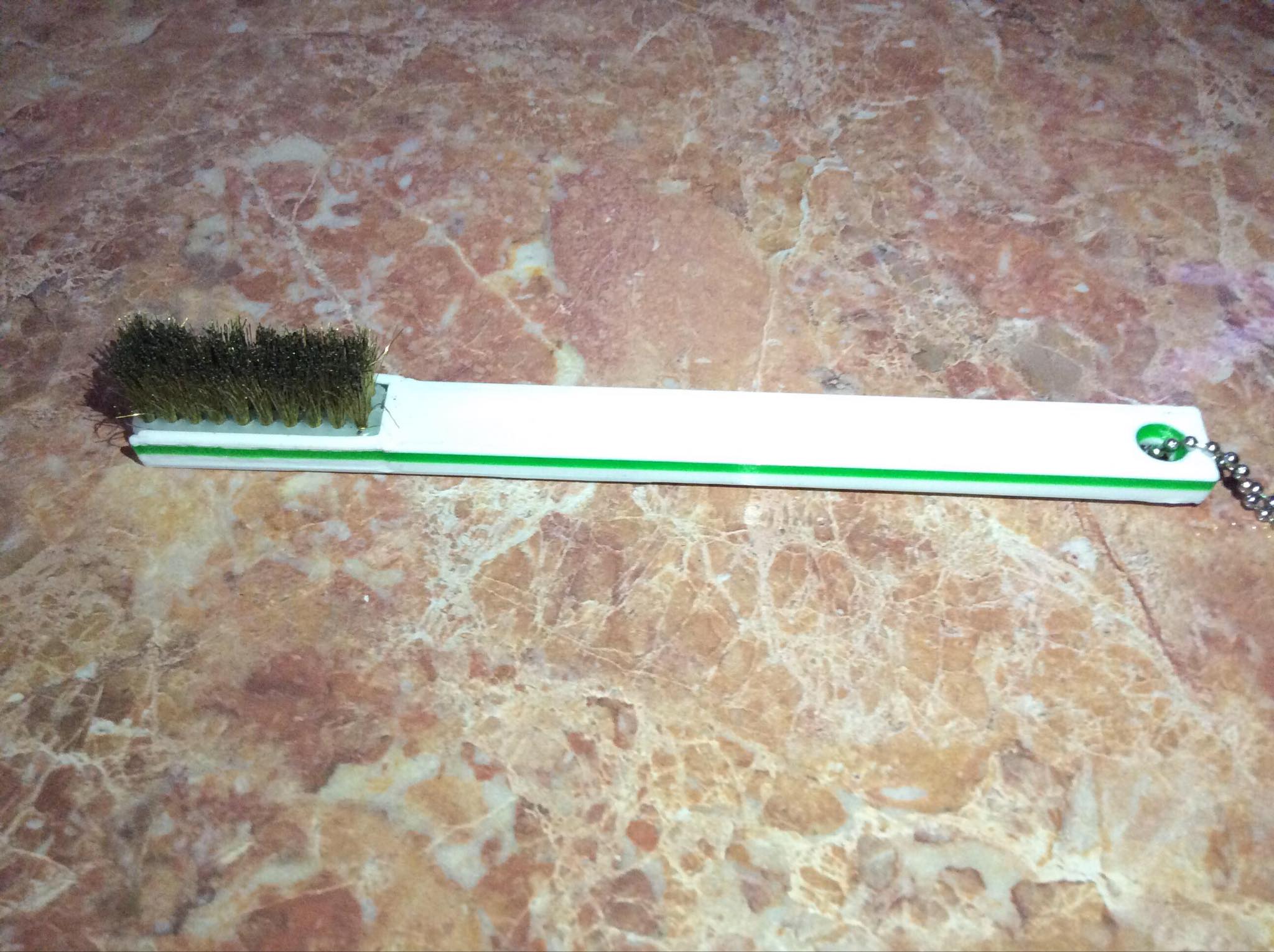 Wire brush handle.