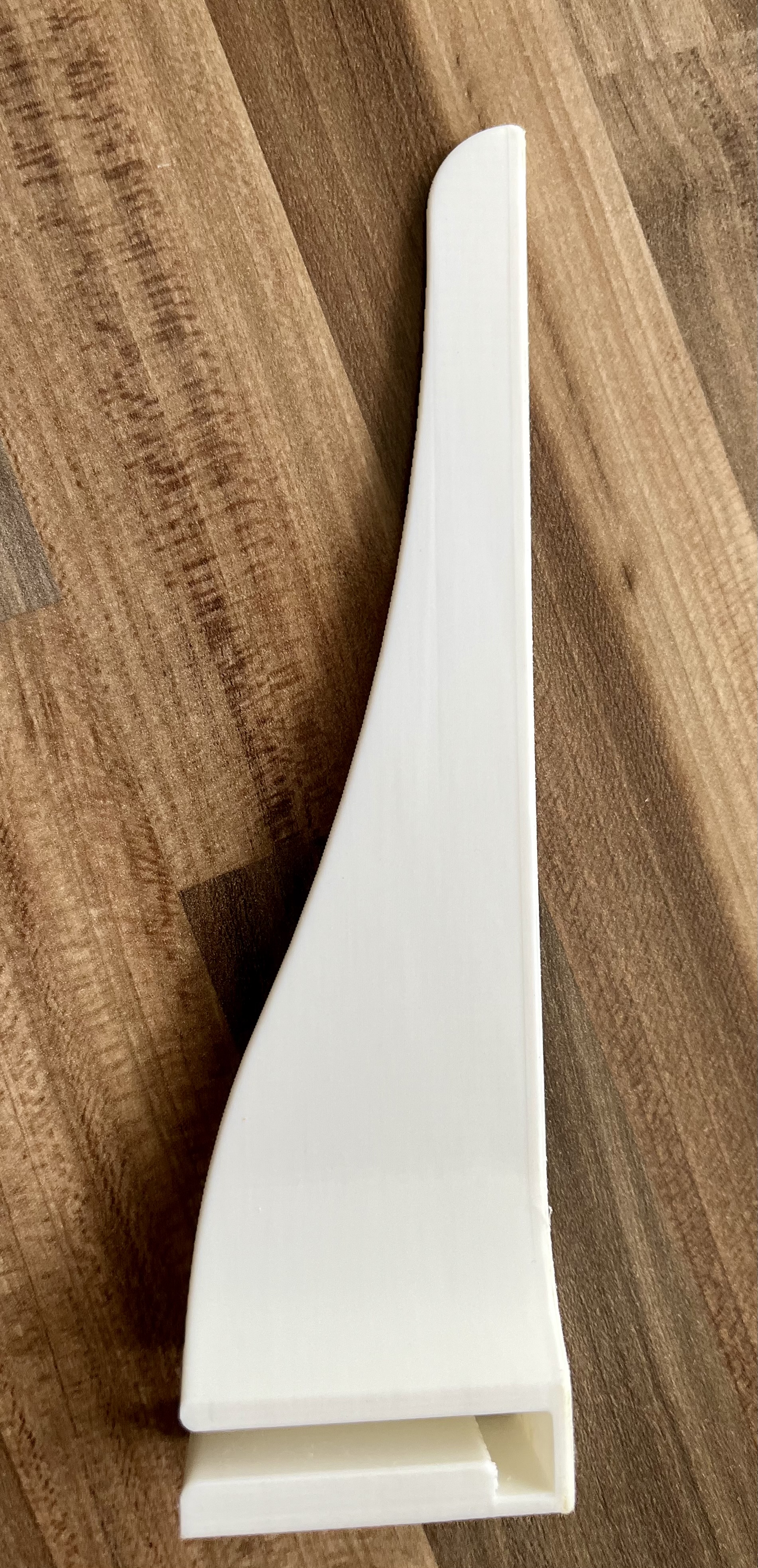 Refrigerator door shelf separator.