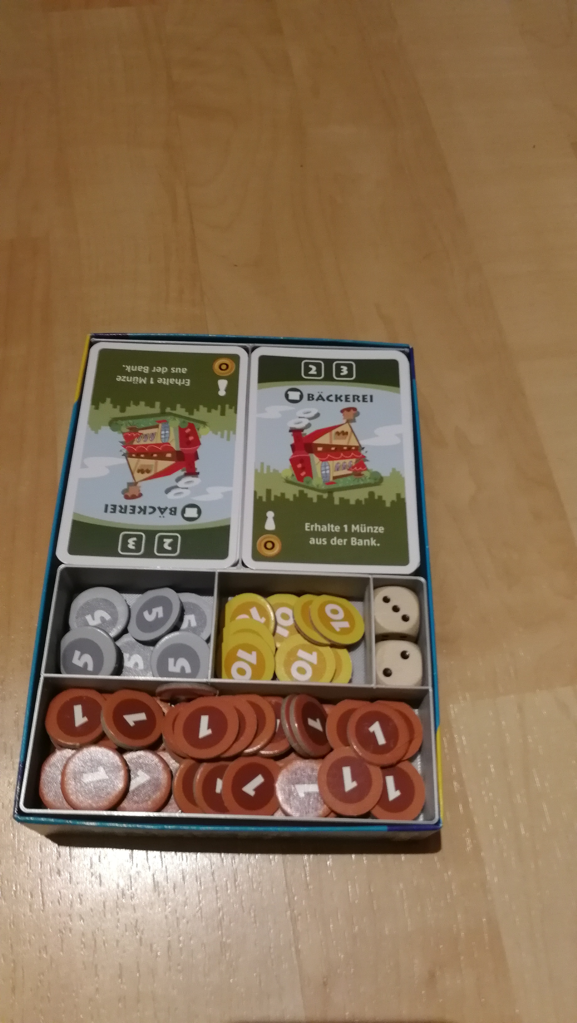 Machi Koro base game and expansion in one box